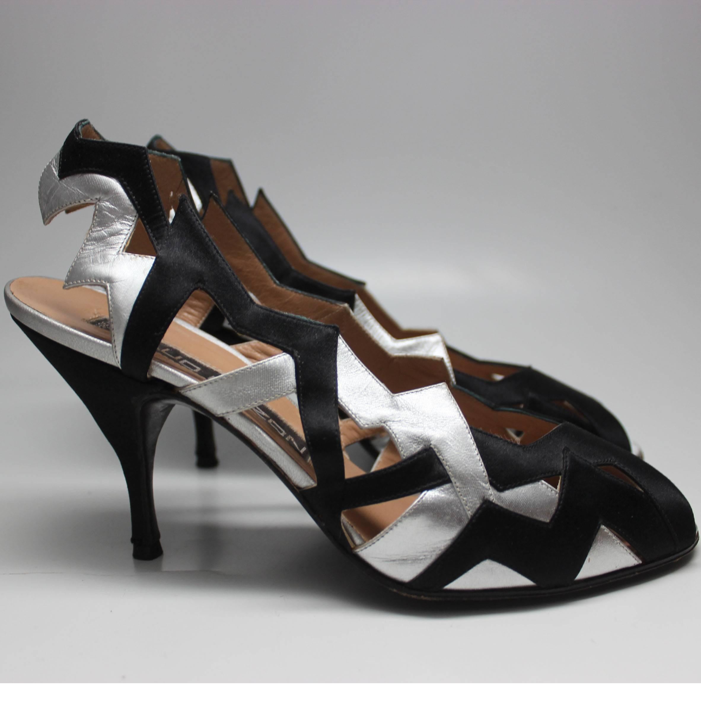 Black and silver satin zigs and zags in an electric pattern. These Maud Frizon shoes are sexy, vibrant, and dynamic. 
Maud Frizon Paris
Made in Italy
Marked size 38 1/2