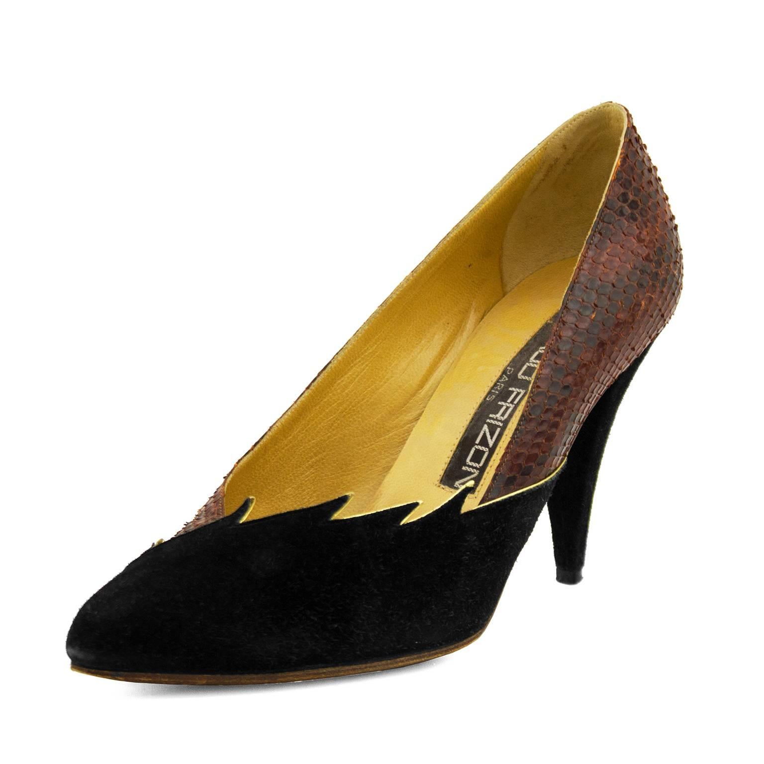 1980s Maud Frizon pumps featuring brown snake skin and black suede with gold trim. Tan leather interior with minimal wear. Tan leather exterior sole with slight signs of age and wear. Black suede heel. Excellent vintage condition. FR size 39 - may