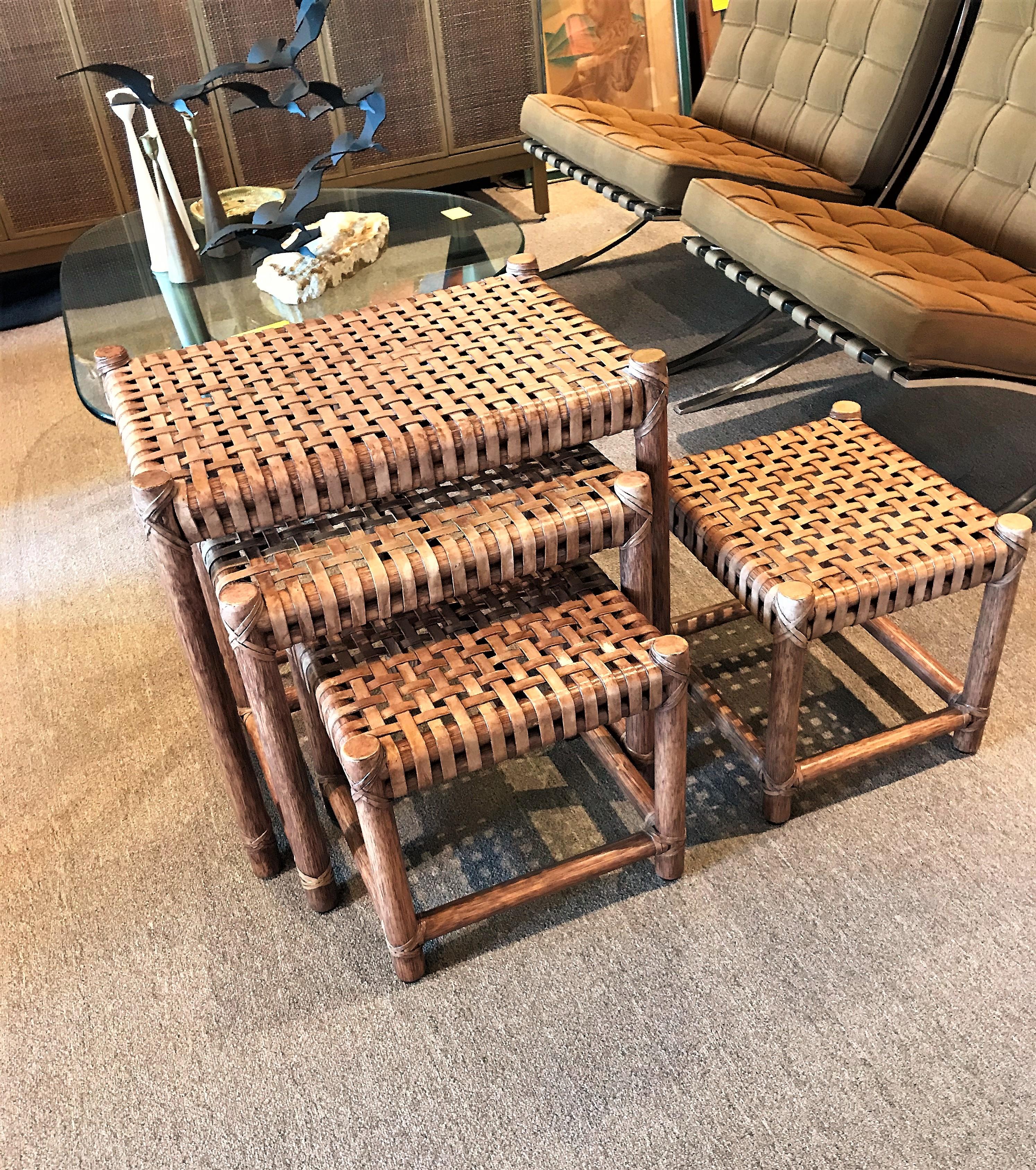 American 1980s McGuire Modern Rattan and Laced Leather Nesting Tables or Stools Set of 4