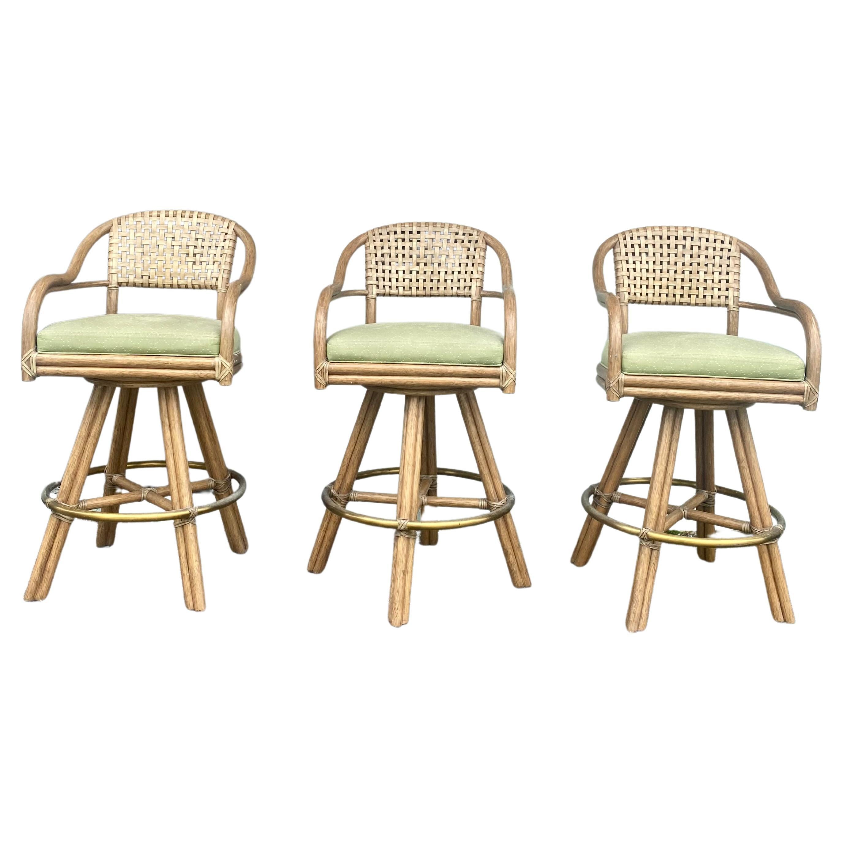 1980s McGuire Swivel Rattan and Leather Bar Stools, Set of 3 For Sale