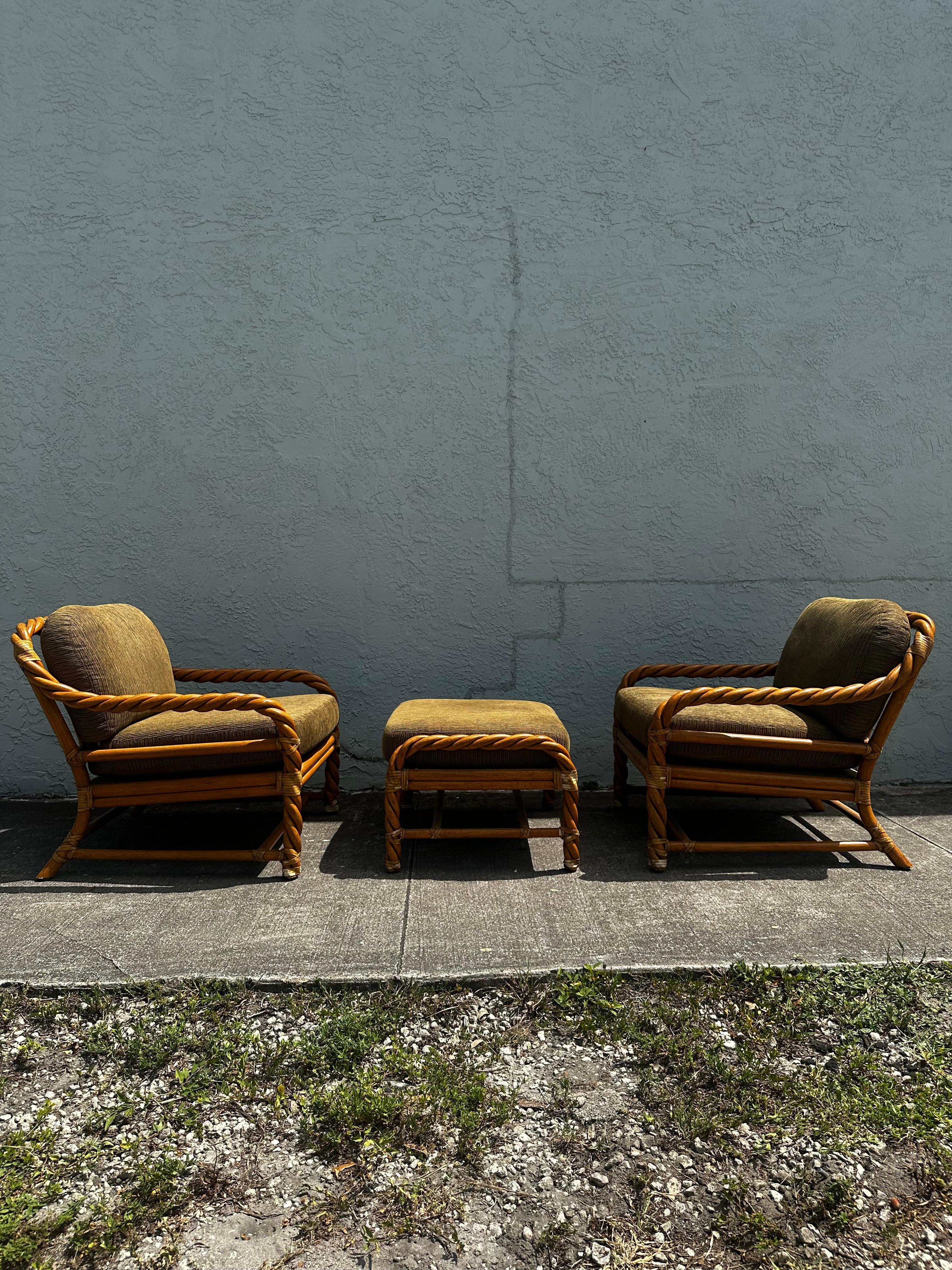 Transport yourself back to the sleek and sophisticated 1980s with this exquisite rattan set in vibrant bamboo print upholstery. The ultra rare set exudes an air of luxury and refinement. Outstanding design is exhibited throughout. The luxurious