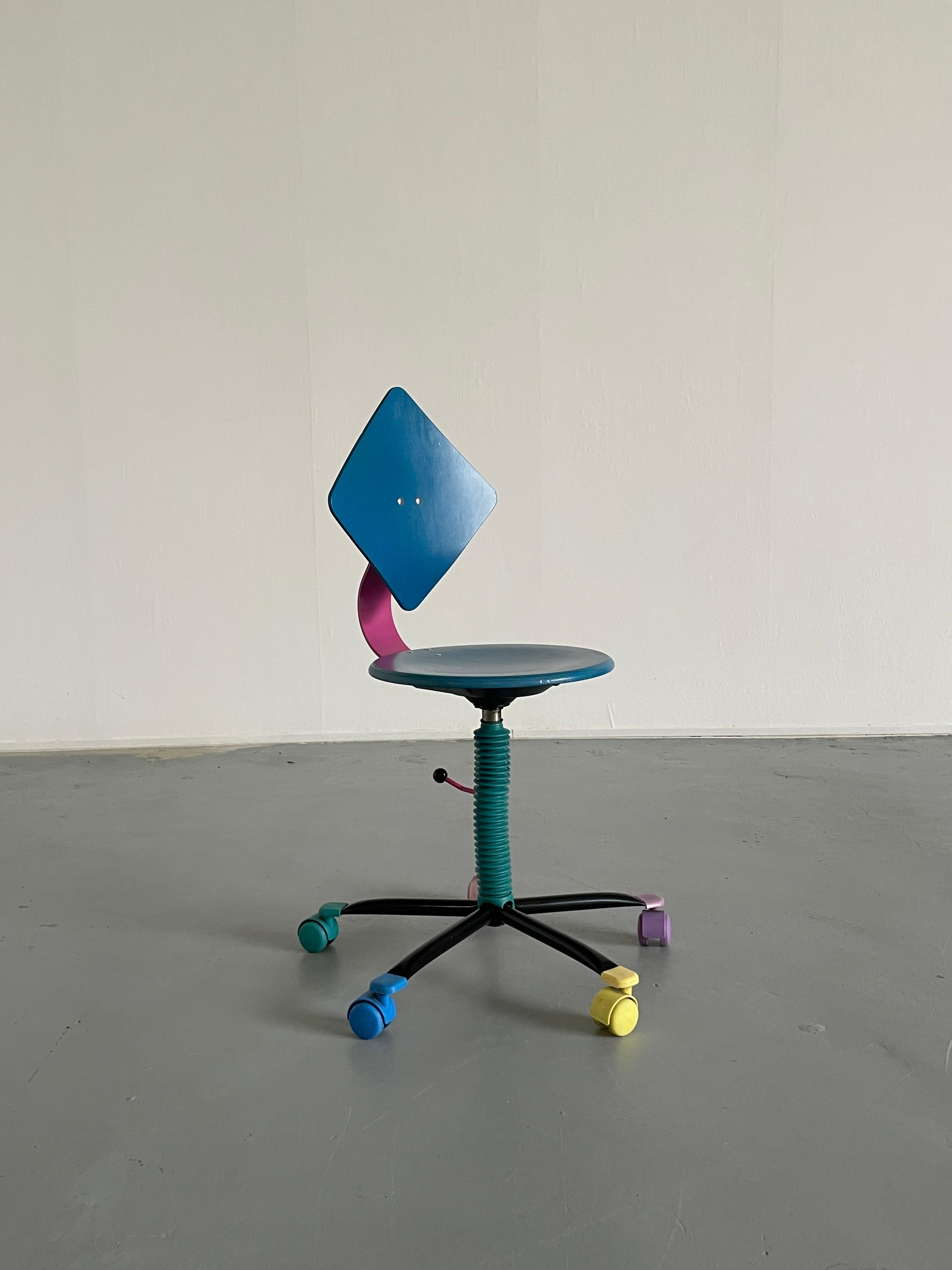 Postmodern Memphis style adjustable office chair or kids chair by the German manufacturer Impac from the late 1980s.

A design that is strongly shaped by a postmodern design language and color world. Seat and backrest are made of wood and lacquered.
