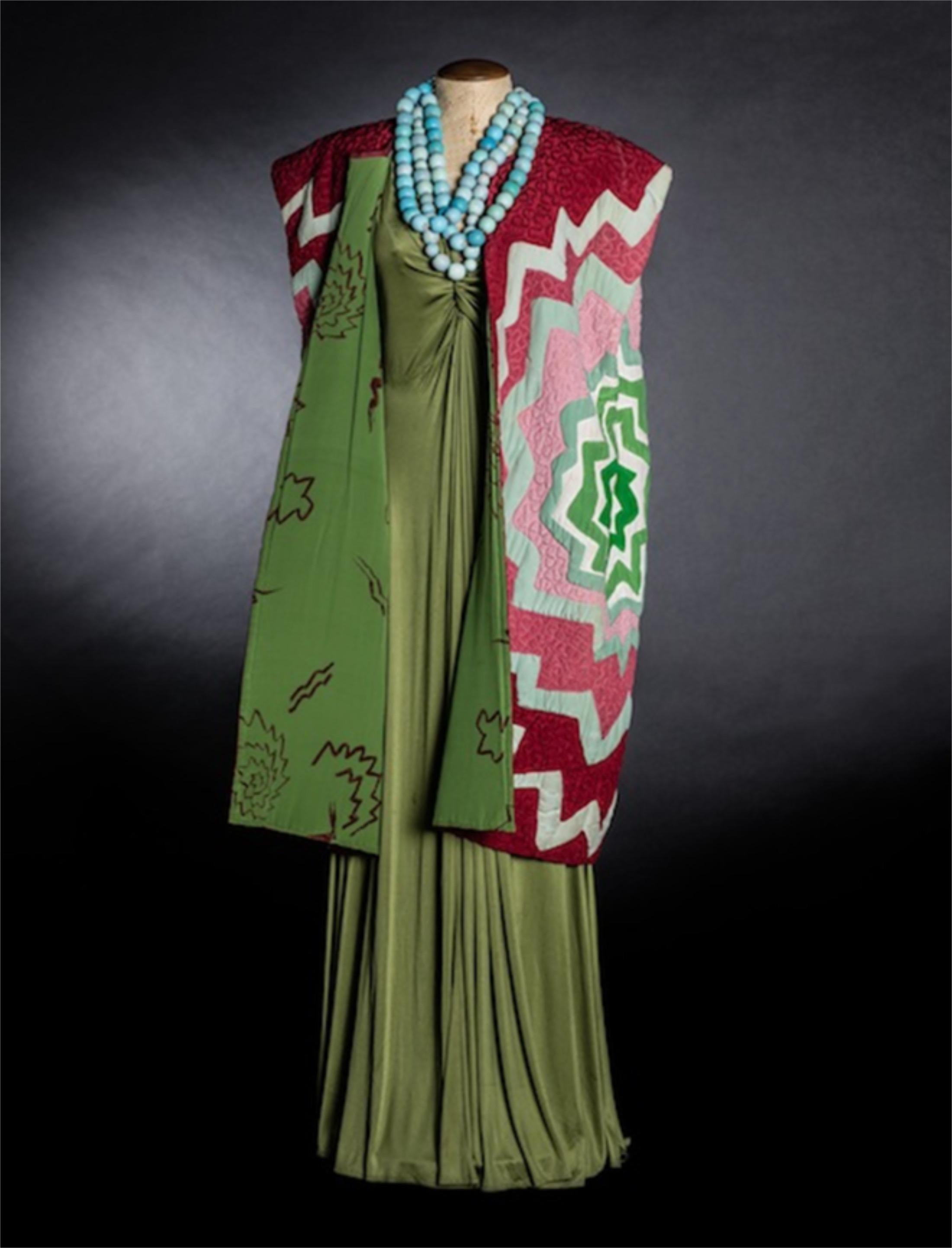 A highly coveted and extremely special Michaele Vollbracht metallic embroidered colorful silk cape with stunning quilting texture dating back the the late 1980's. Vollbracht is among America’s greatest contributions to fashion. His prowess as an