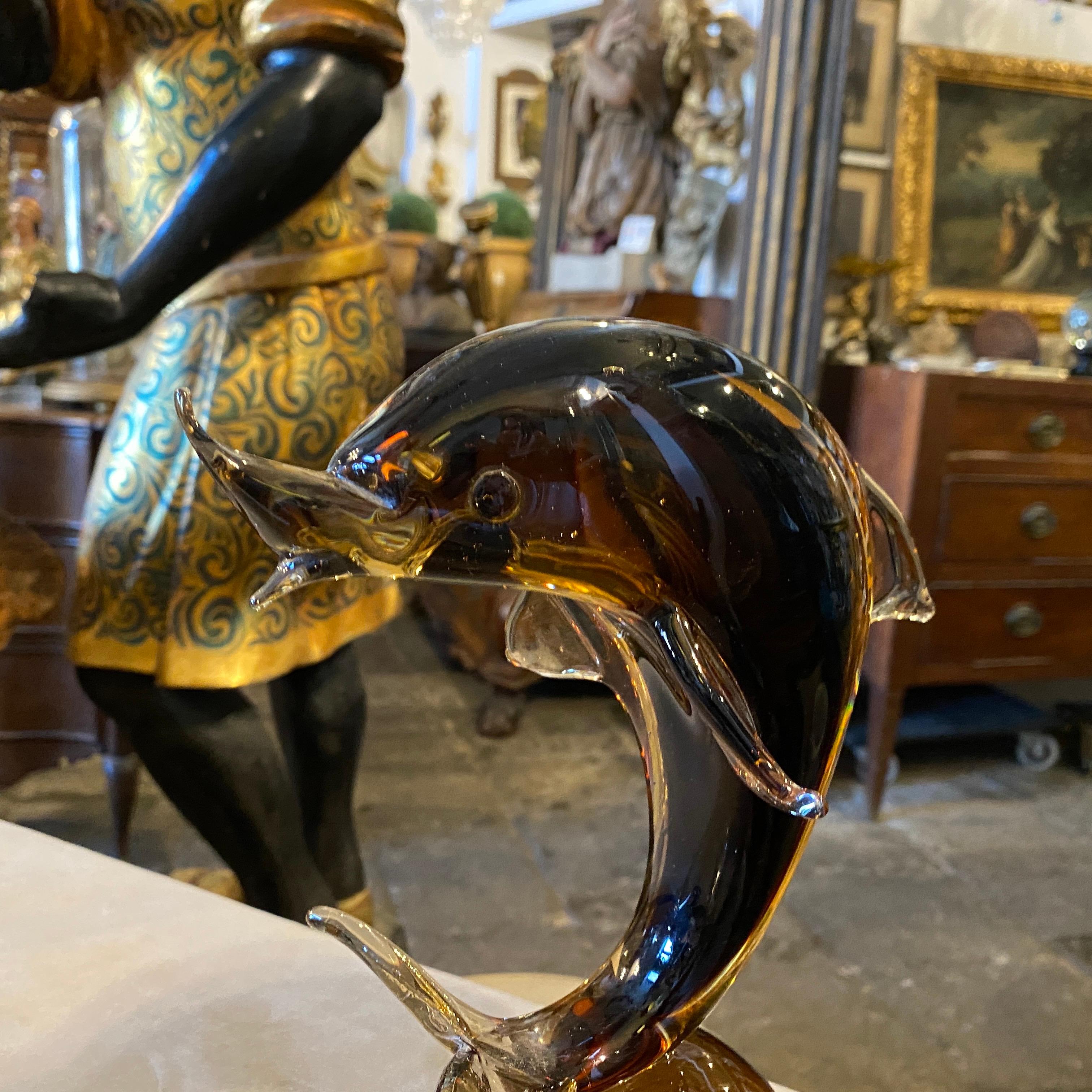 A rare brown murano glass dolphin in perfect conditions, it has been made in the eighties.