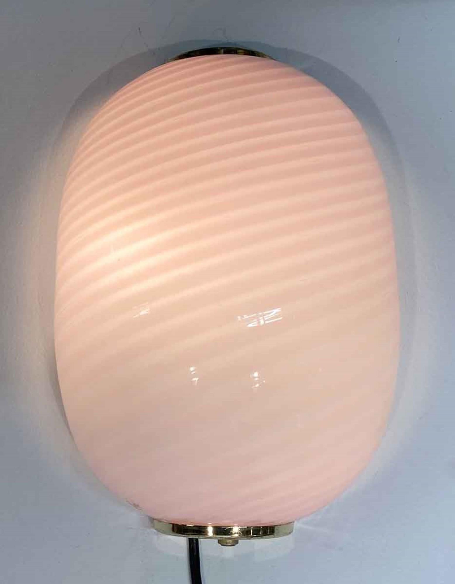 1980s hand blown pink striped Murano glass wall sconce. Cheerful pink candy cane style stripe color. Cleaned and rewired.  
 Small quantity available at time of posting. Priced each. Please inquire. Please note, this item is located in our Scranton,