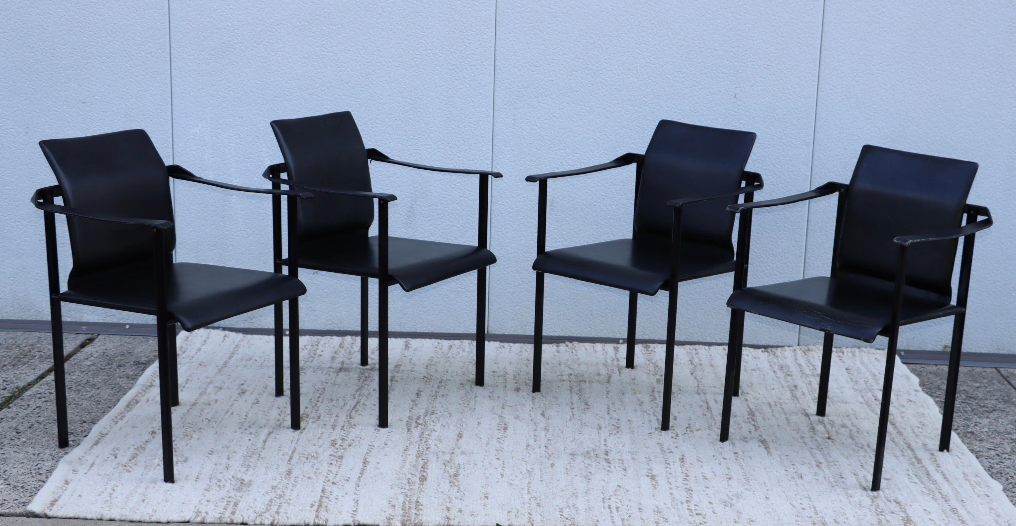 Beautiful set of 4 1980's leather sculptural dining chairs attributed to Marcello Cuneo, in vintage original condition with some wear and patina due to age and use, there is some wear to the leather.