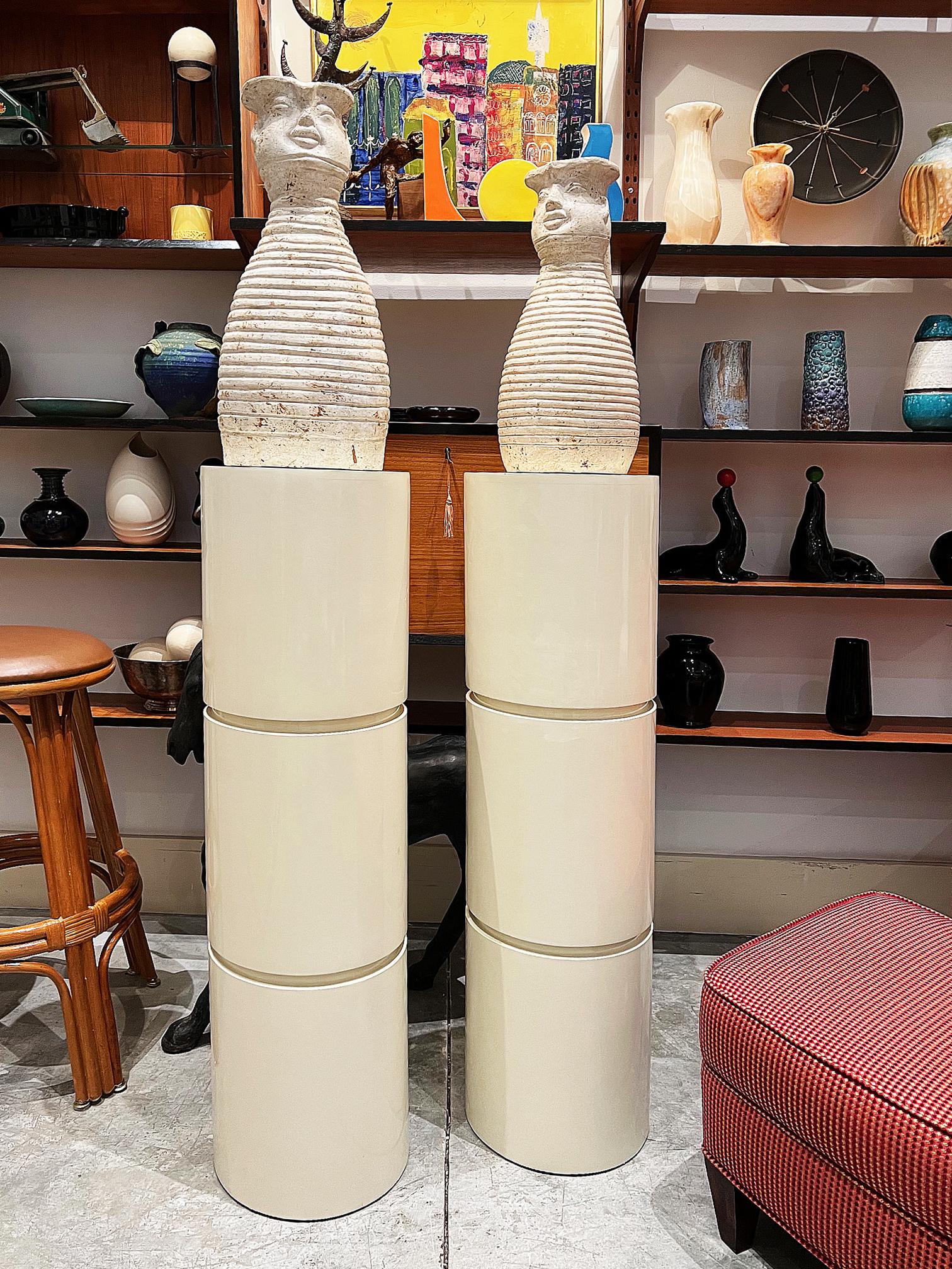 1980s Mod lacquered wood pedestals, custom-made pair

Offered for sale is pair of substantial 1980s Mod wood pedestals with reveal details that are ideal for displaying art or objects. We believe that these were custom-made from wood and finished