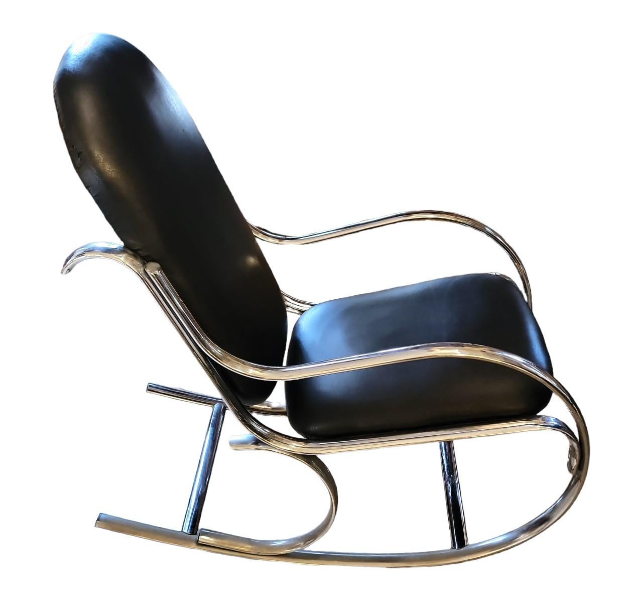 Modern chrome Thonet-style rocking chair. 
Wonderful Curved chrome frame. strong and sturdy. Leather is in g used condition.
22L x 40W x 40H.



