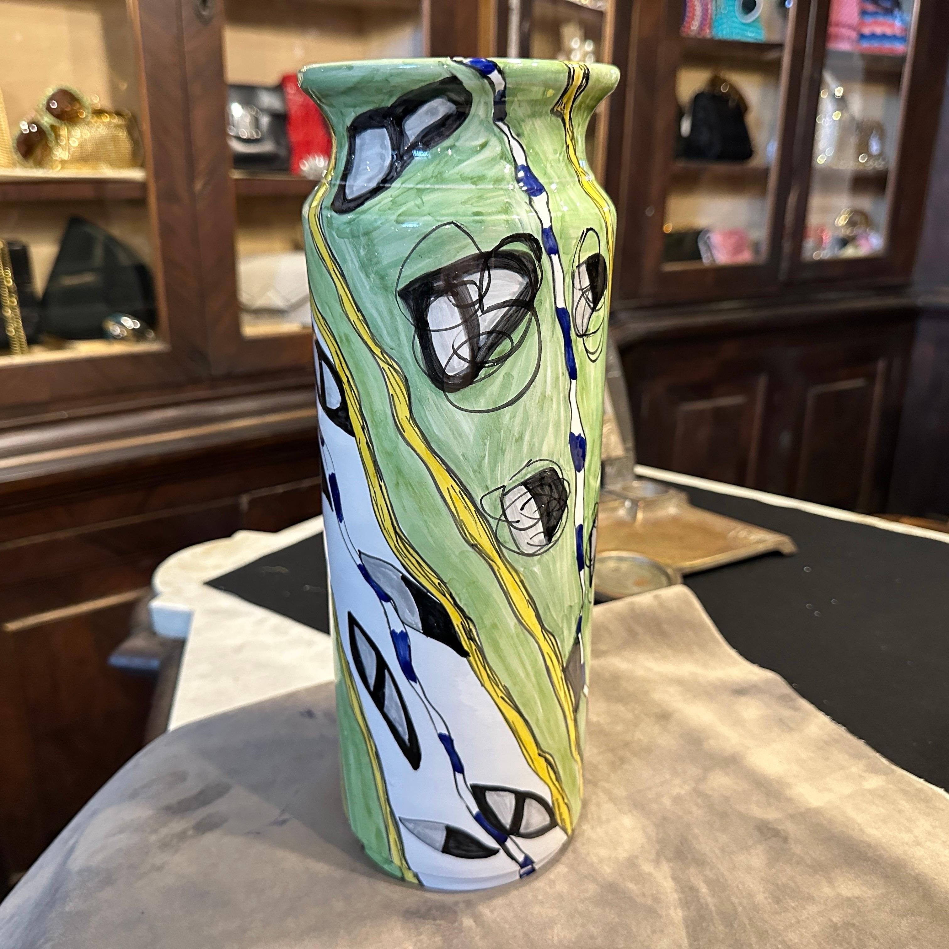 This unique, hand-painted ceramic vase is a striking piece of Sicilian art from the 1980s. Signed on the bottom by 