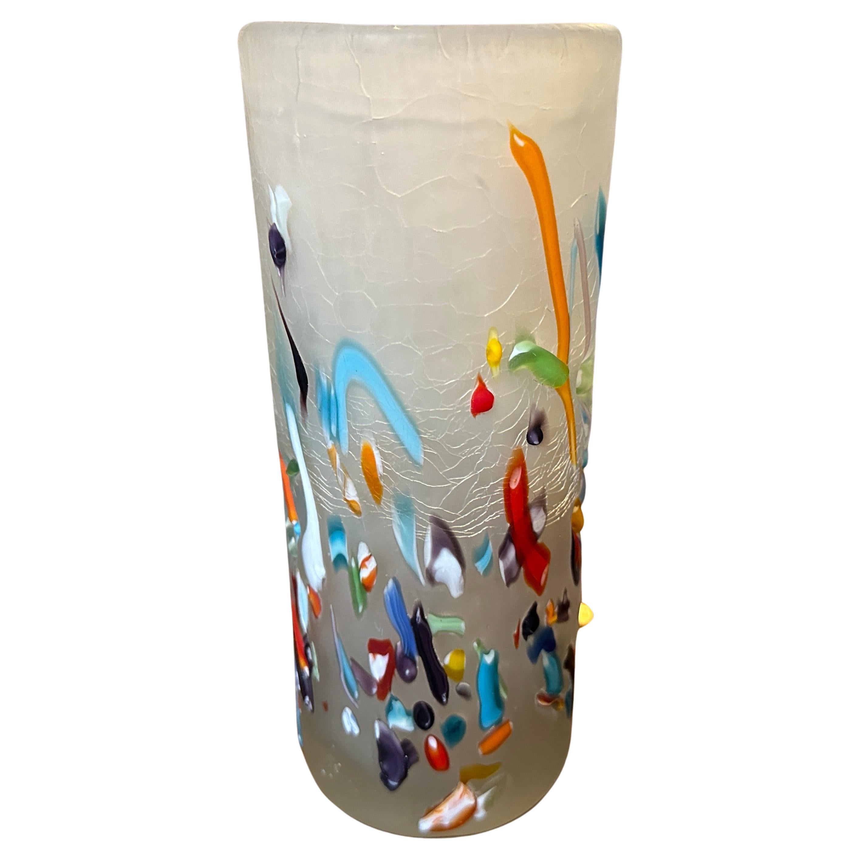 1980s Modern Murano Glass Cylinder Vase – Multicolor Millefiori Style
Brighten up your space with this stunning 1980s Modern Murano glass cylinder vase, an eye-catching piece that celebrates the artistry of Italian glassmaking. Handcrafted in