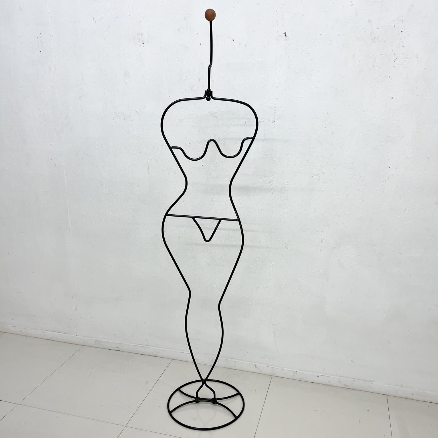 1980s Modern Nude Valet Häpen by Ehlen Johansson Sweden
Tubular metal art wire frame with wooden-ball top.
In the style of John Risley wrought iron metal art.
72 tall x 16.25 w x 15.25
Preowned unrestored vintage condition.
See images