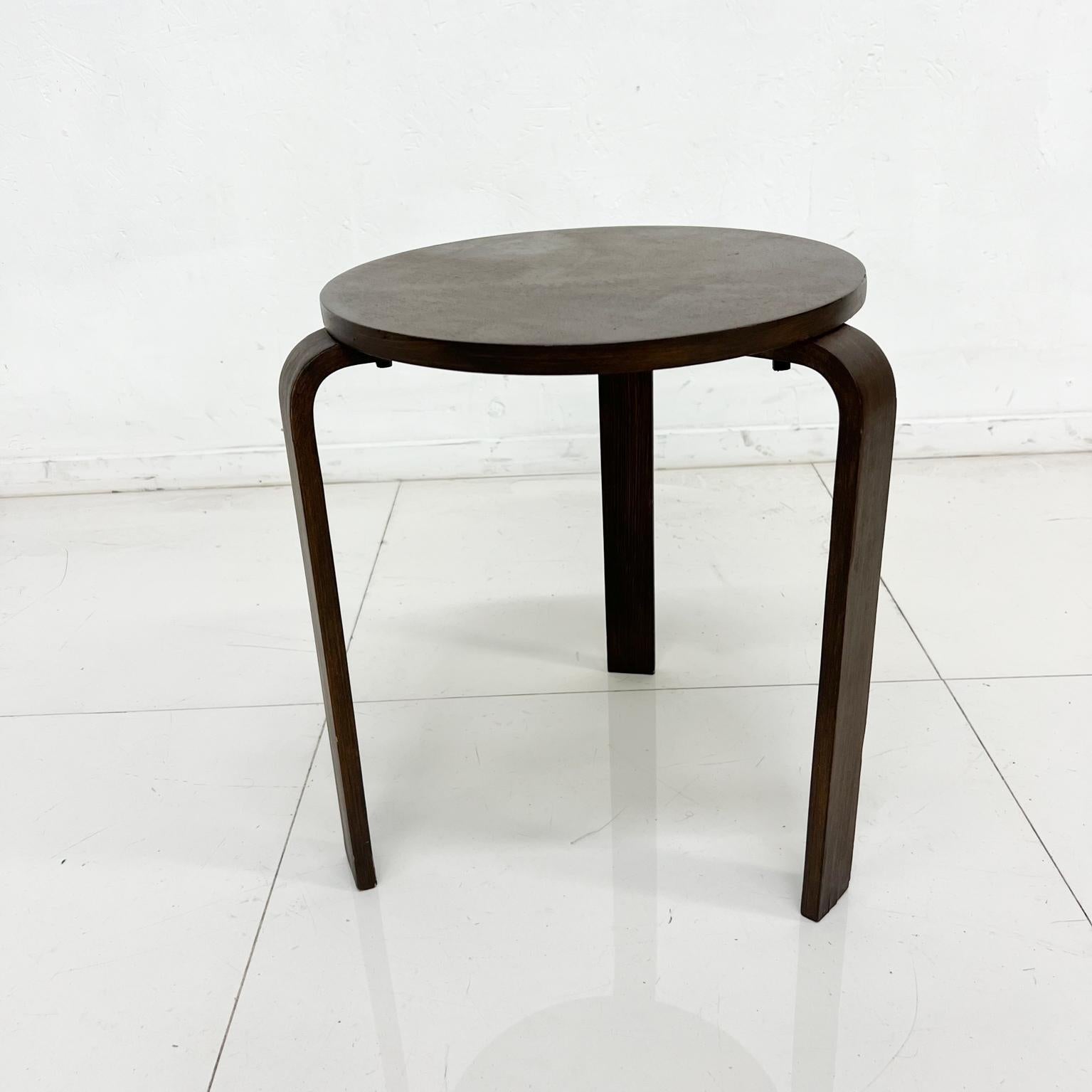 1980s low wood stool Design by Alvar Aalto for Artek Denmark
Scandinavian Modern Classic
Dark stained wood.
Useful as a small side table.
Measures: 17.5 tall x 15.5 depth
Original vintage preowned condition.
 It has a repair on the legs. Hard