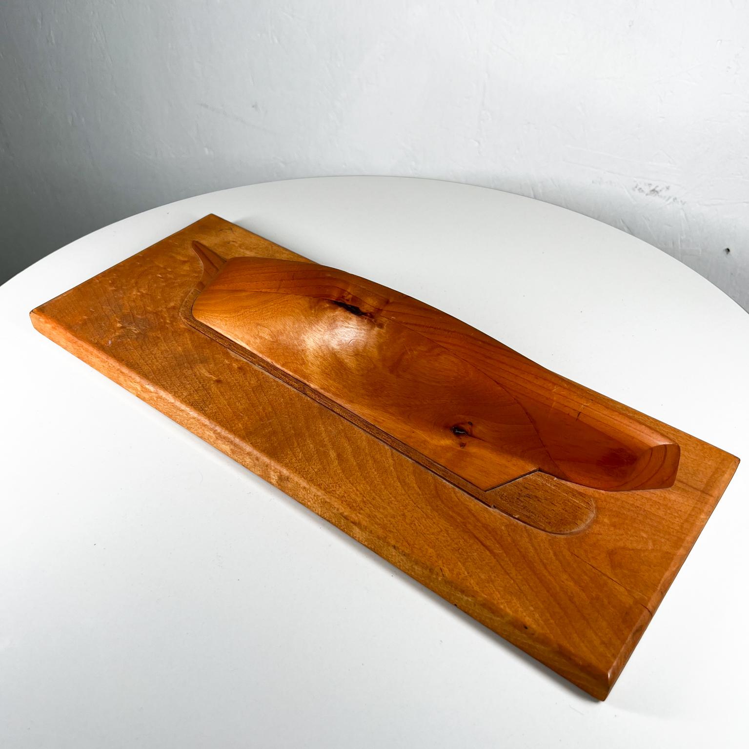 1980s Modernist Art Exotic Wood Boat Sculpture
Artisan custom made boat art in exotic woods (looks like solid maple),
No stamp present.
Trivia- Trump has one similar seen on the wall in his Trump Tower office.
17.25 w x 6.63 tall x 3 d
Original