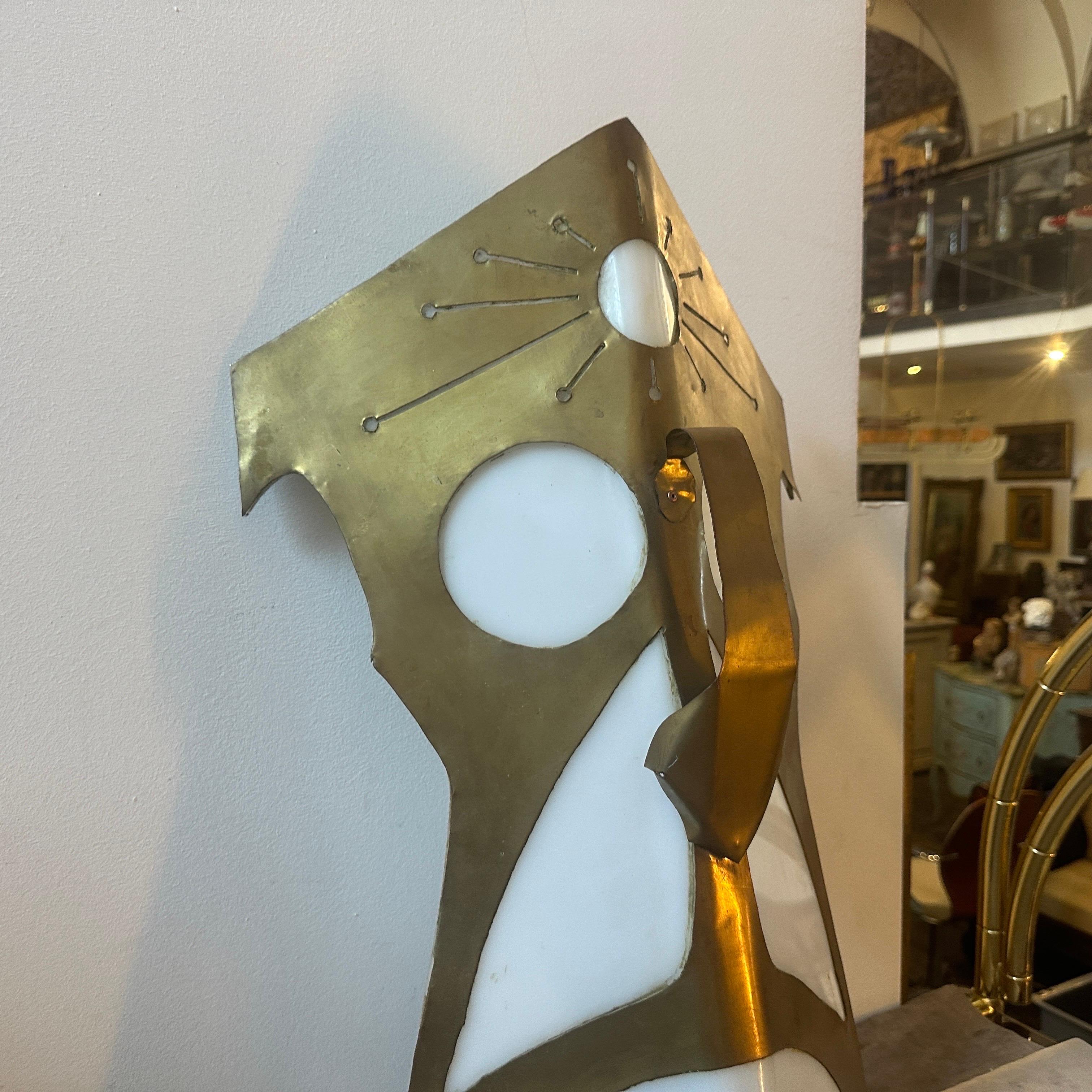 Hand-Crafted 1980s Modernist Brass and White Plexiglass Tribal Mask Wall Light For Sale