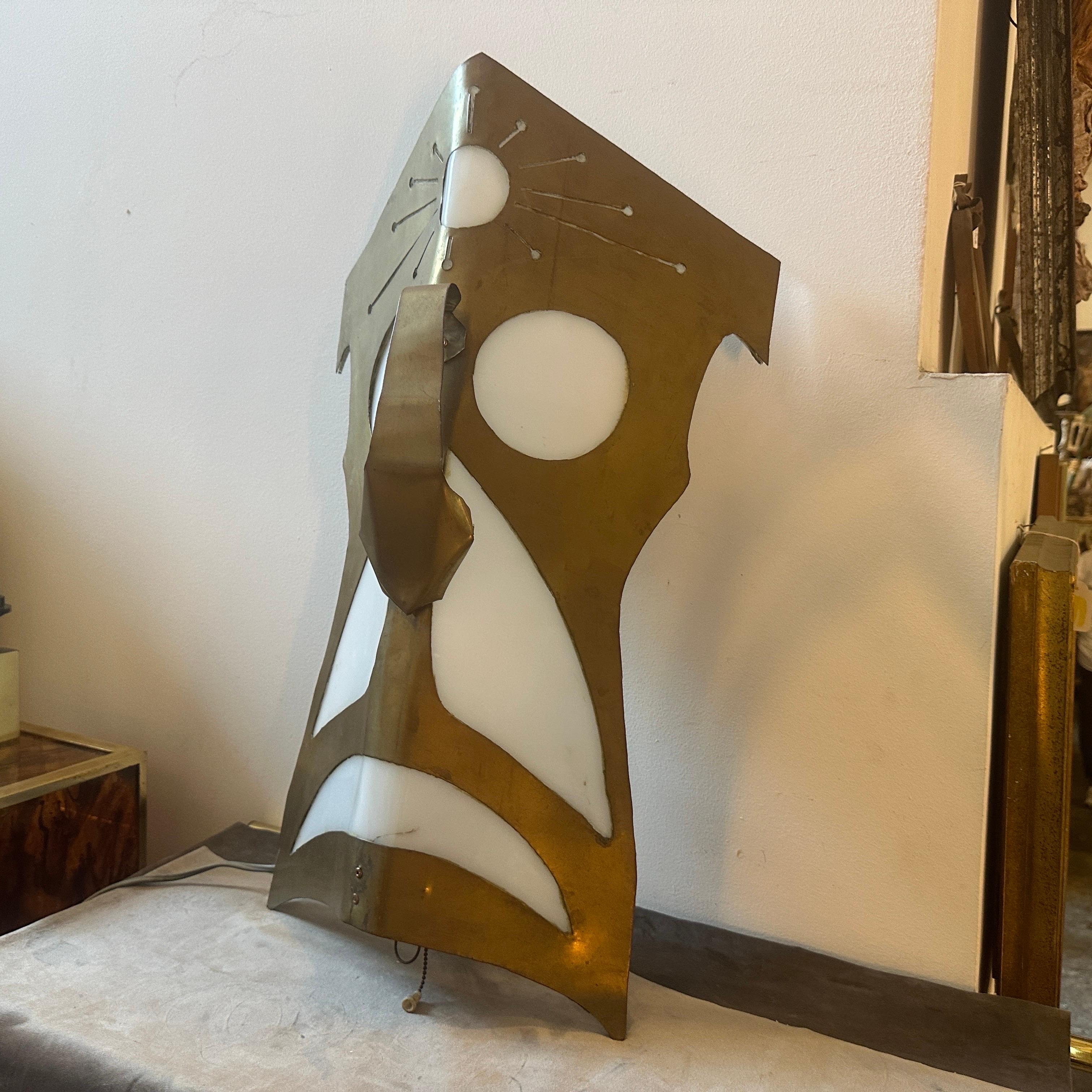 1980s Modernist Brass and White Plexiglass Tribal Mask Wall Light For Sale 1