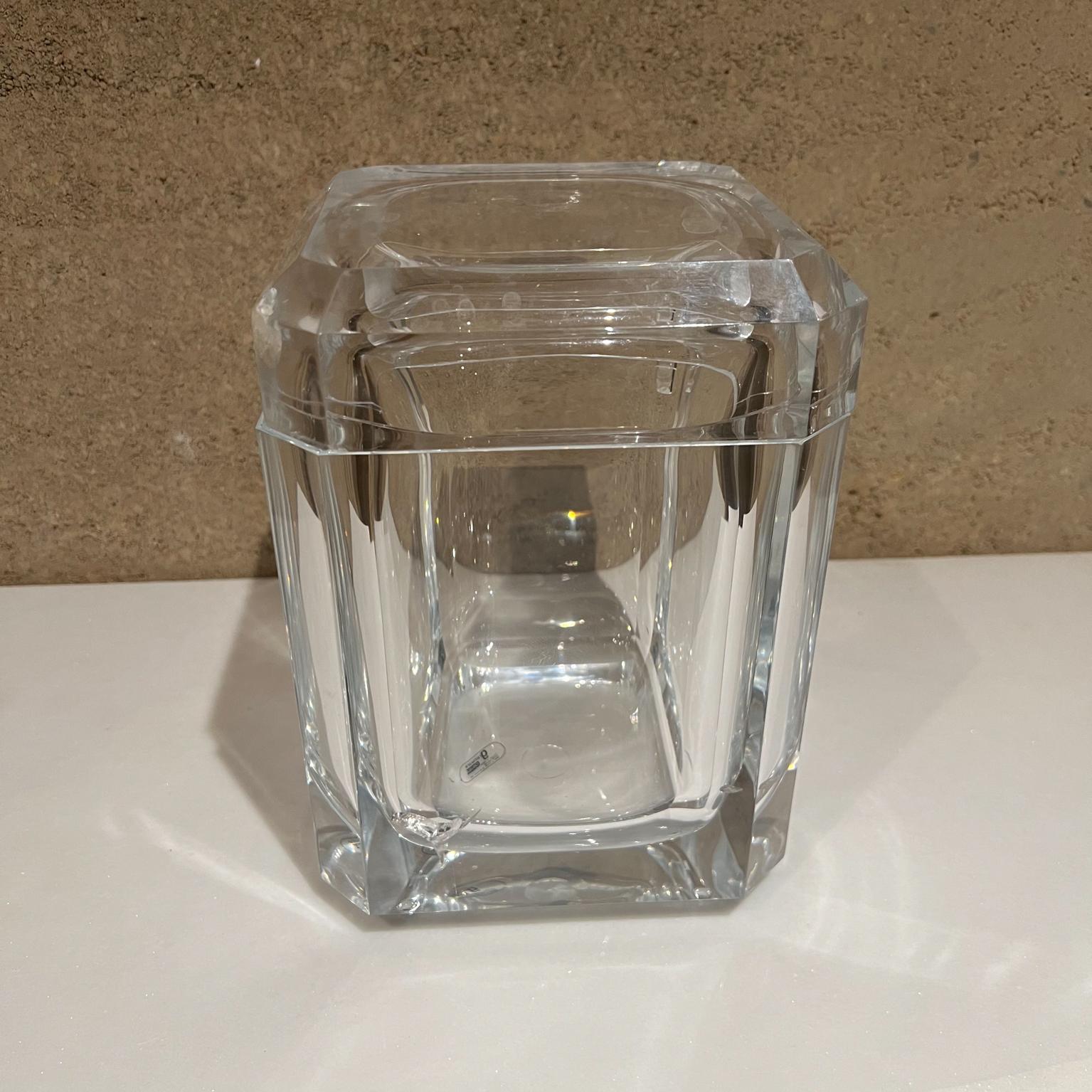 Ice Bucket
Lucite ice bucket in the style of Alessandro Albrizzi Italy
Stamped with maker's logo; Grainware Carlisle
Measures: 9 tall x 7.75 w x 7.75
Vintage condition pre-owned. It has a hairline crack on the inside of bucket and one repair on