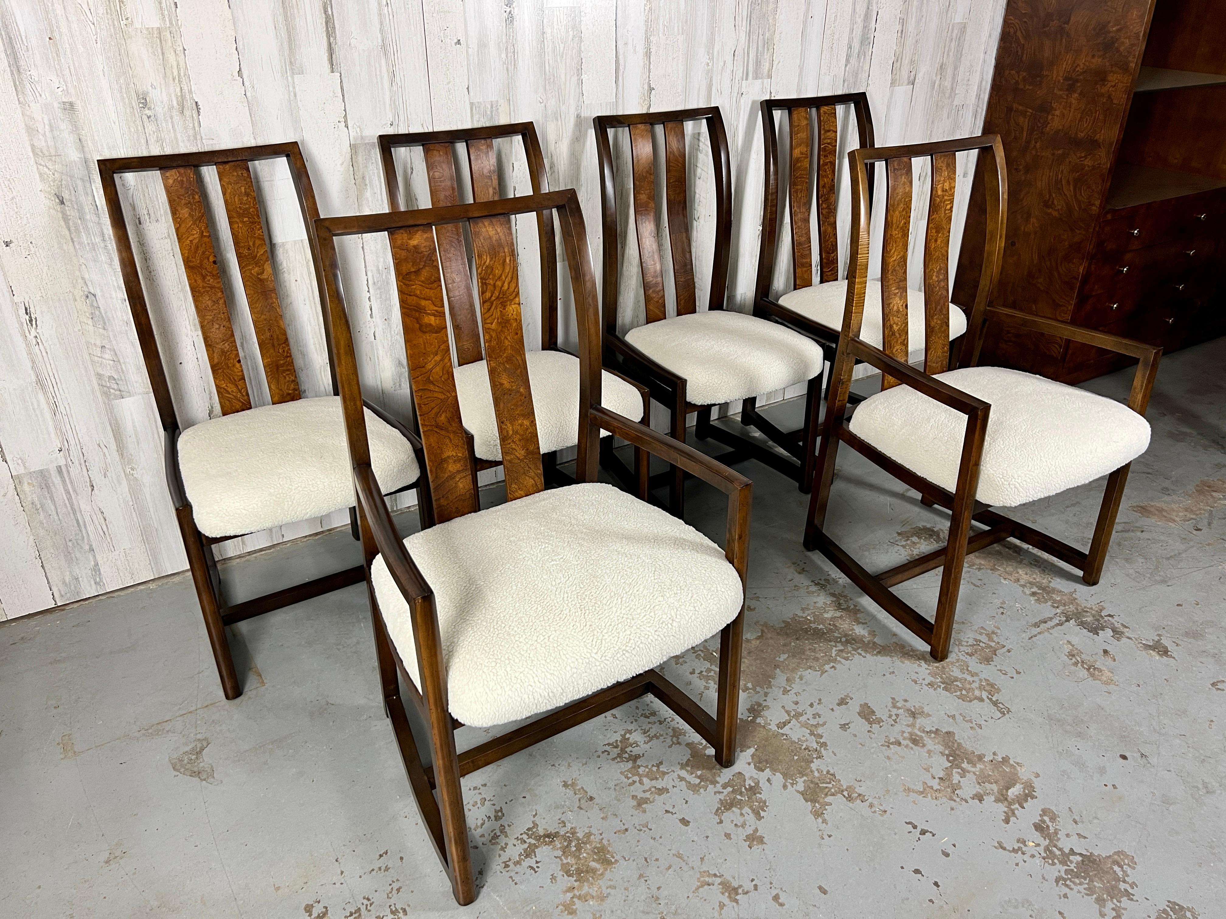 Very comfortable set of six dining chairs with two arm chairs and four side chairs. Very curvy lines and burl wood panels on the front and back. New Sherpa faux fur seat covers.

Non arm chairs measurements: 23.25 D x 19.50 W x 39.38 H x 19 seat