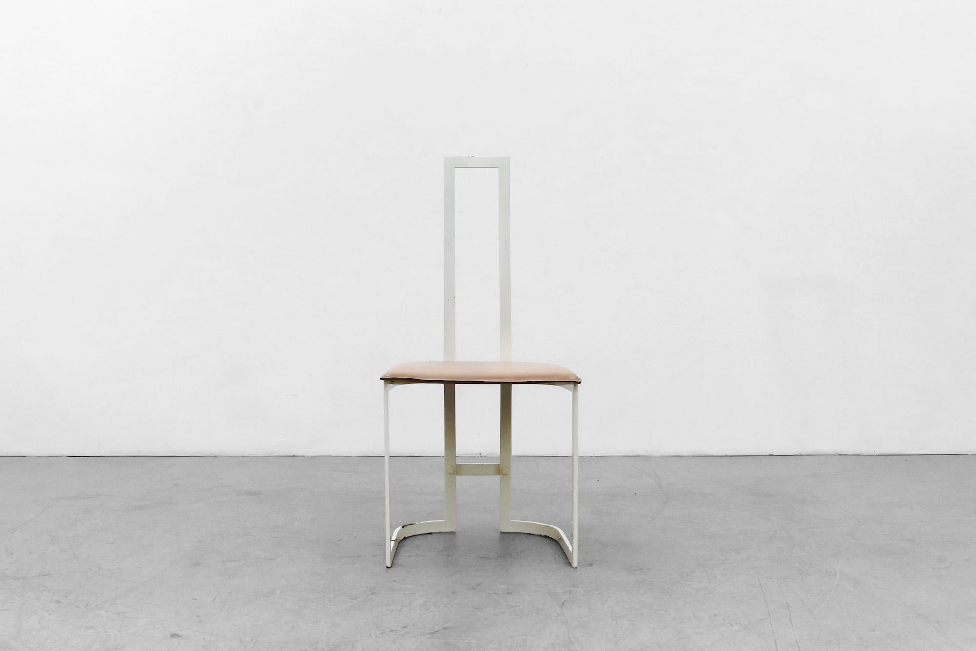 Modernist Gastone Rinaldi side chair for Thema Italy 1. This chair has a white enameled metal frame and a tan leather seat. In original condition, with heavy signs of wear including some enamel loss to frame, consistent with age and use. Another