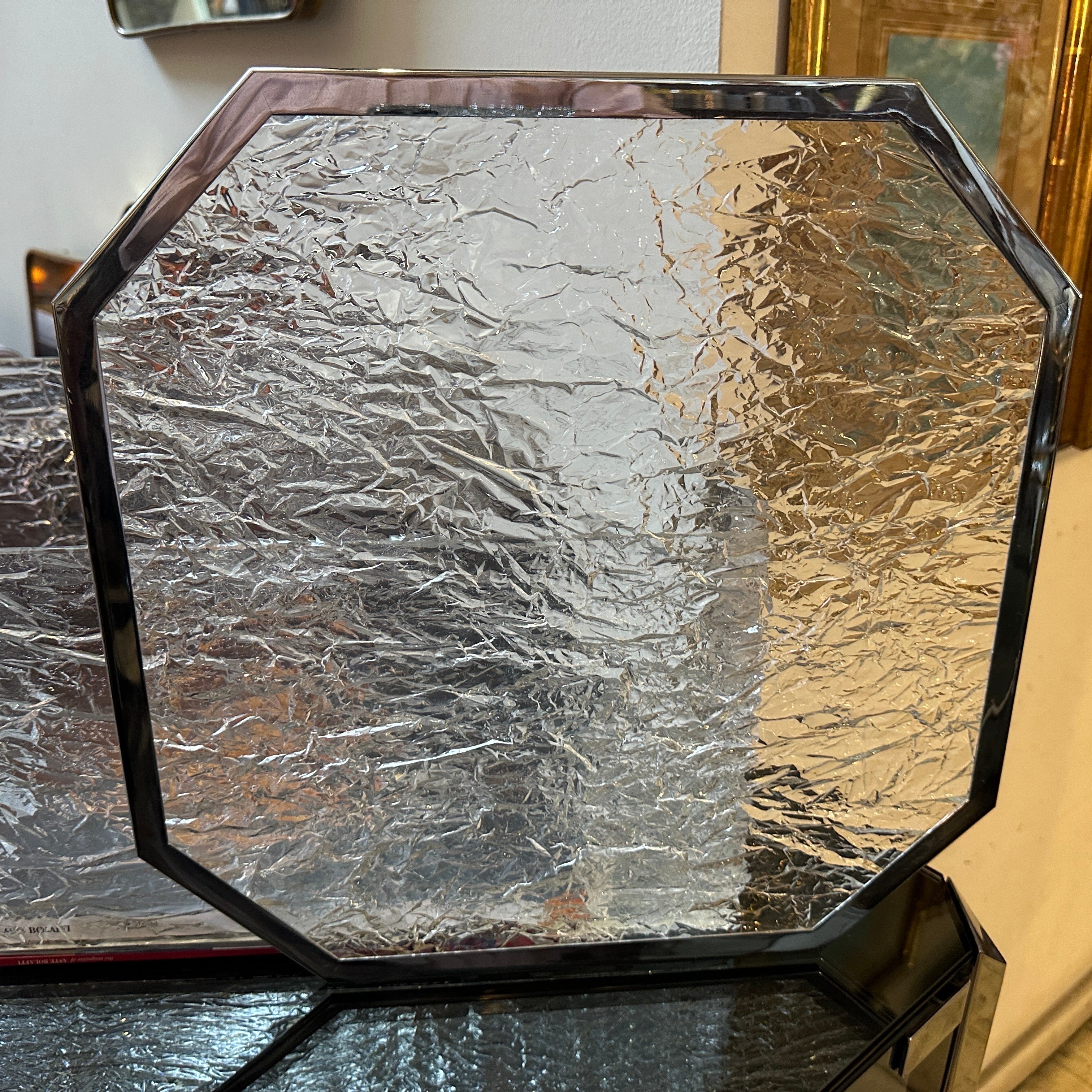 1980s Modernist Ice Lucite and Silver plated Italian Tray by Ulderico Cavinato
This octagonal Tray by Ulderico Cavinato embodies the spirit of its era, blending cutting-edge materials with timeless design principles to create a visually stunning and