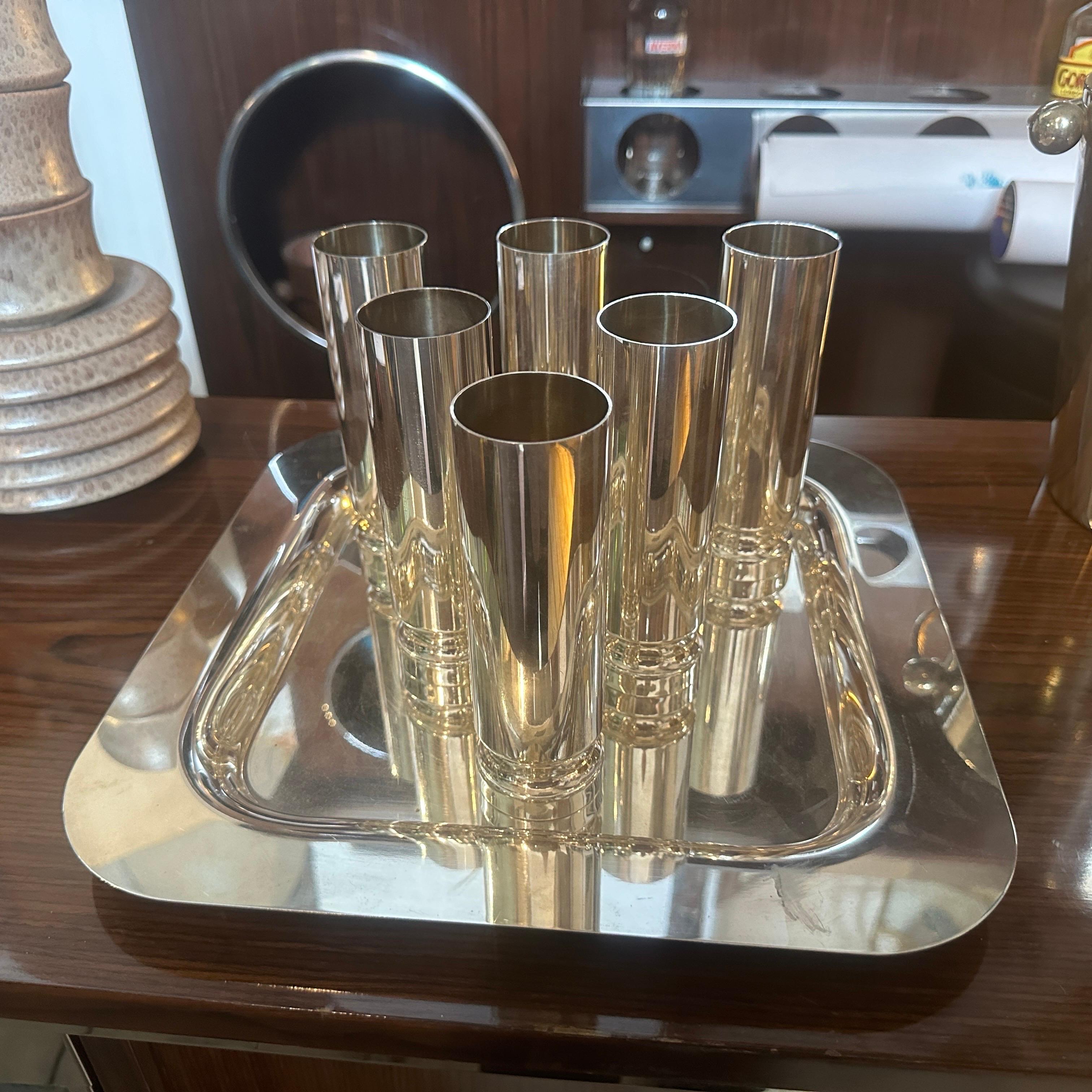 A high-quality silver-plated tray and flutes designed and manufactured in Italy in the Eighties by Disatron Silver, they are in original very good condition. The height of the flutes is 16 cm, and they have the original label on the bottom. The