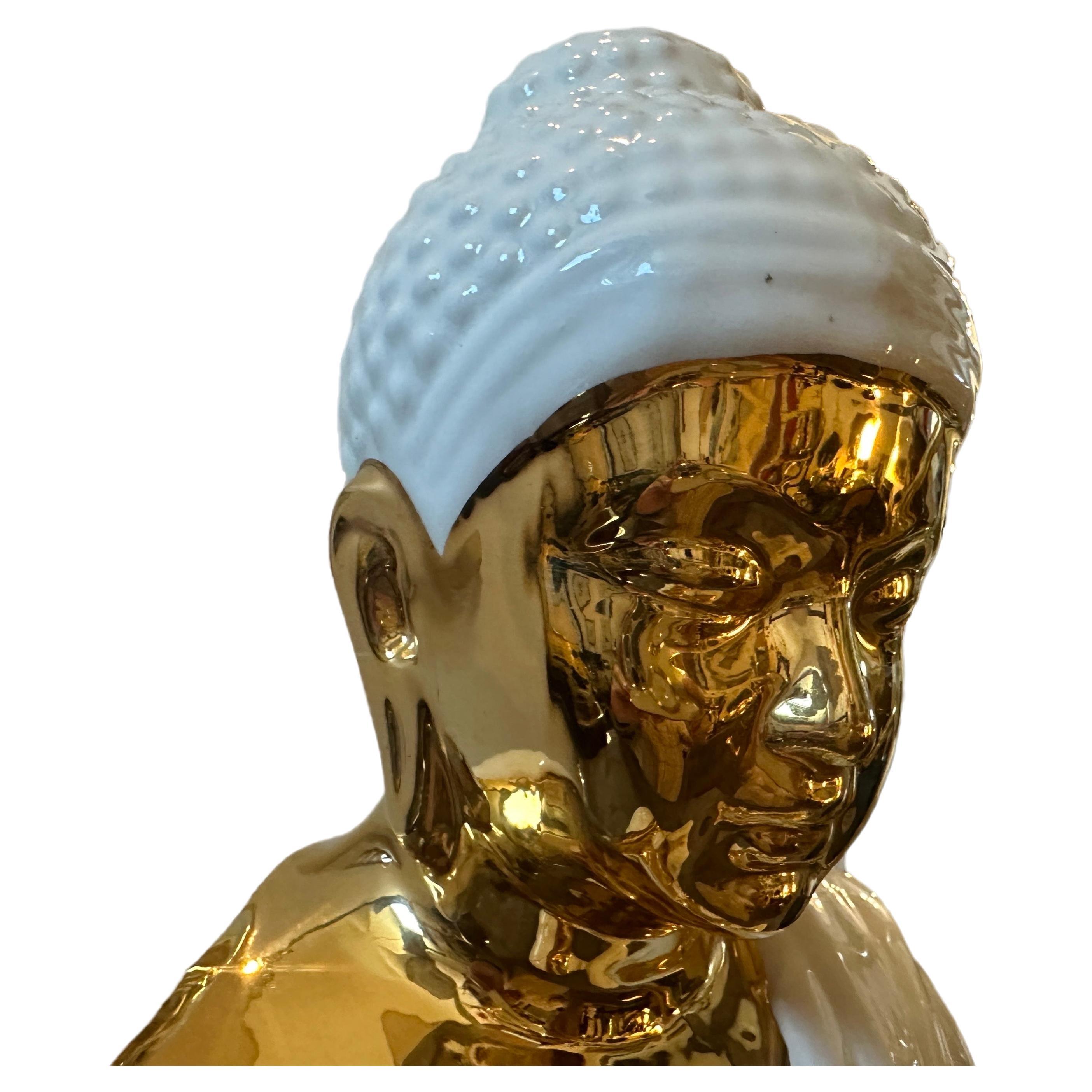 This 1980s Buddha Statue by Tommaso Barbi combines elements of traditional spirituality with the clean lines and simplicity of Barbi design. It serves not only as a decorative piece but also as a representation of inner peace and enlightenment,