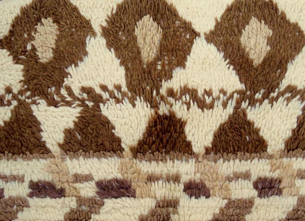 1980s Moroccan Azilal rug handwoven with ivory and shades of brown high pile wool in a Berber design. Dimensions: 3'10 x 5'6
