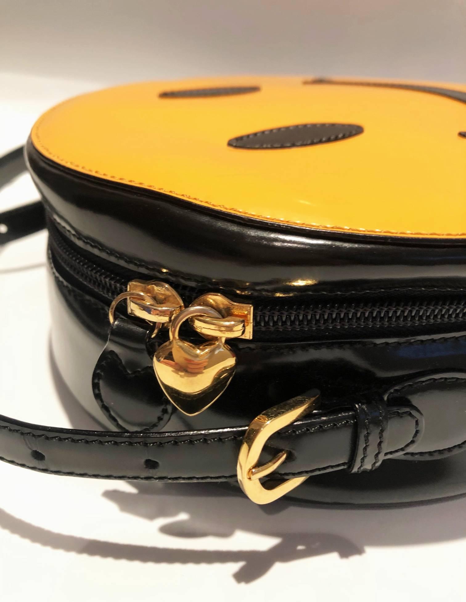 Orange 1980s Moschino acid face smiley shoulder bag