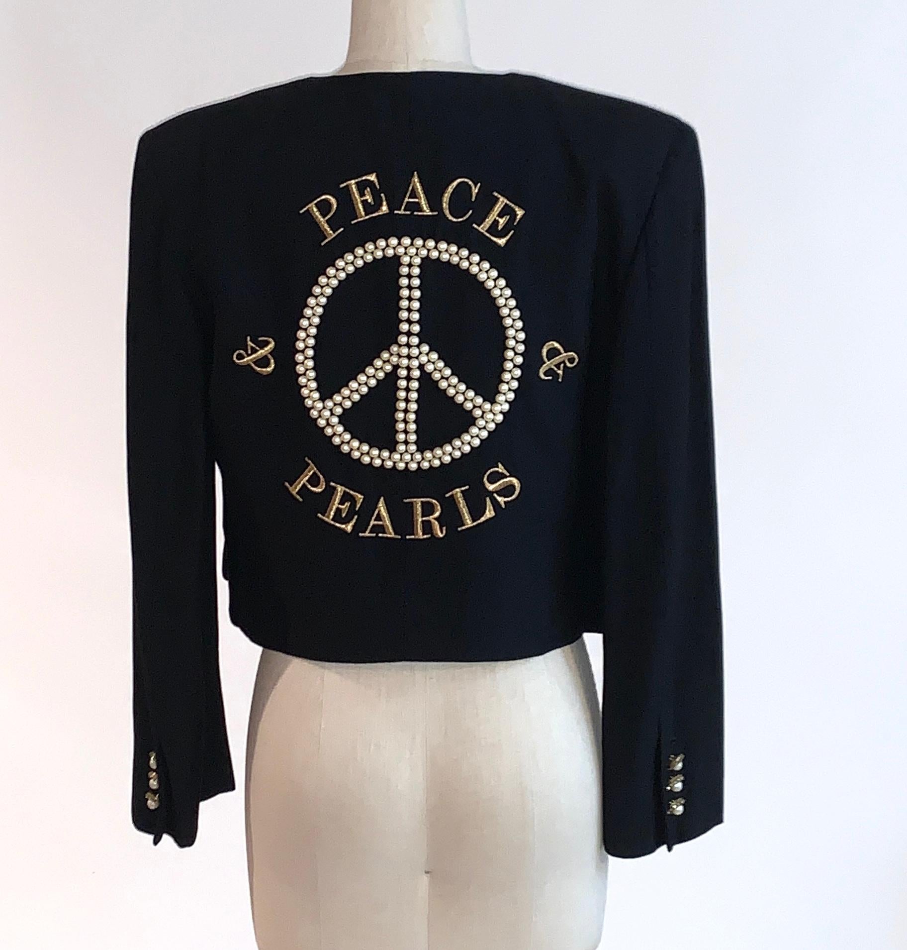 Moschino Couture peace and pearls short jacket featuring pearl peace sign embellishment at back and gold embroidery reading 