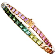 1980s Multi-Color Gemstones Rainbow 18 Karat Gold Line Bracelet