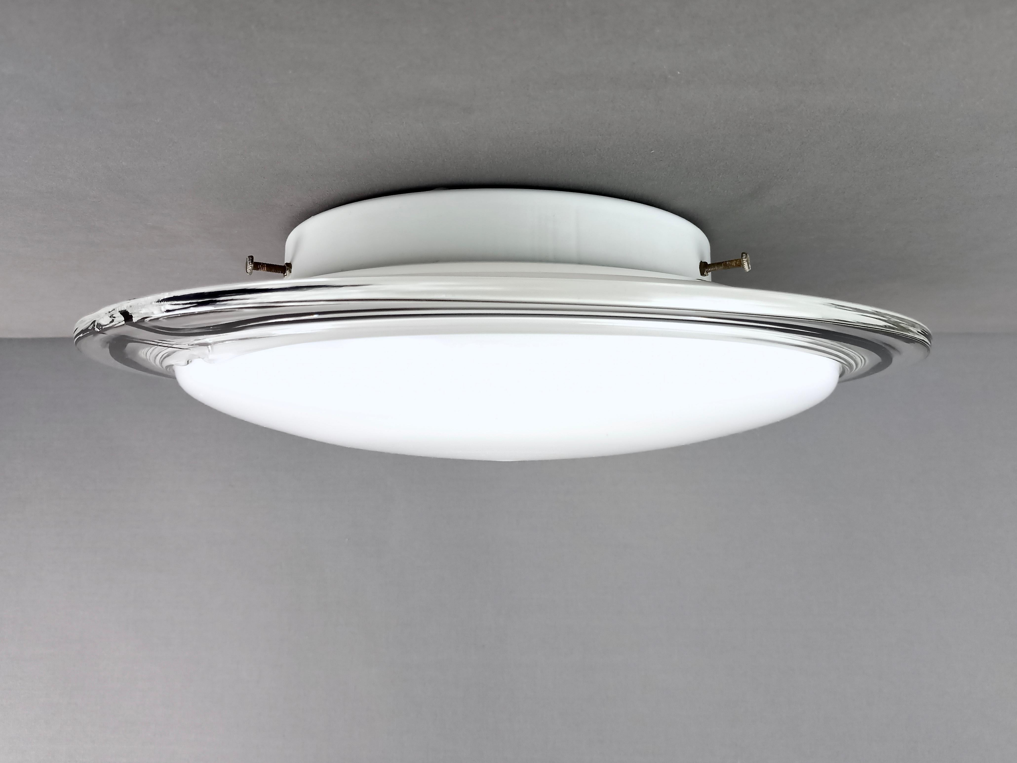 Modern 1980s Murano glass one-light ceiling lamp with clear and black glass edge.  For Sale
