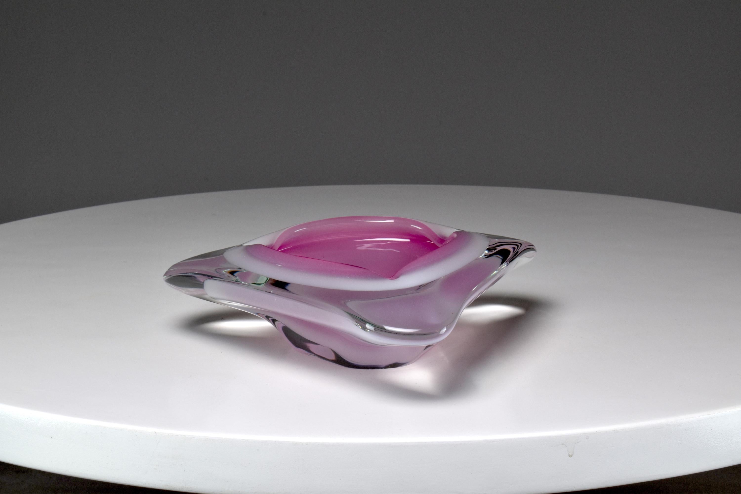 20th century vintage Venetian Vetreria Oball Murano glass ashtray in sommerso style colours of milky white and pale pink. 
Italy. Circa 1980's. 
Beautiful condition. 






We are an exhibition space and an online destination established by the