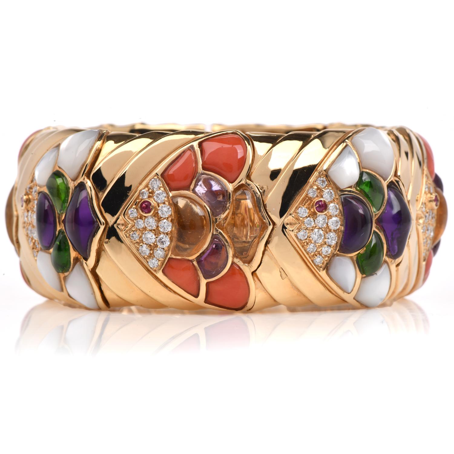 This Heavy Naturalia 18K Gold cuff Bracelet, is the perfect complement for any ensemble. It weighs a hefty 133.3 grams 

This Italian 1990s Well-Made Piece is expertly crafted in solid heavy 18K yellow gold, featuring Coral, Amethyst, Peridot,