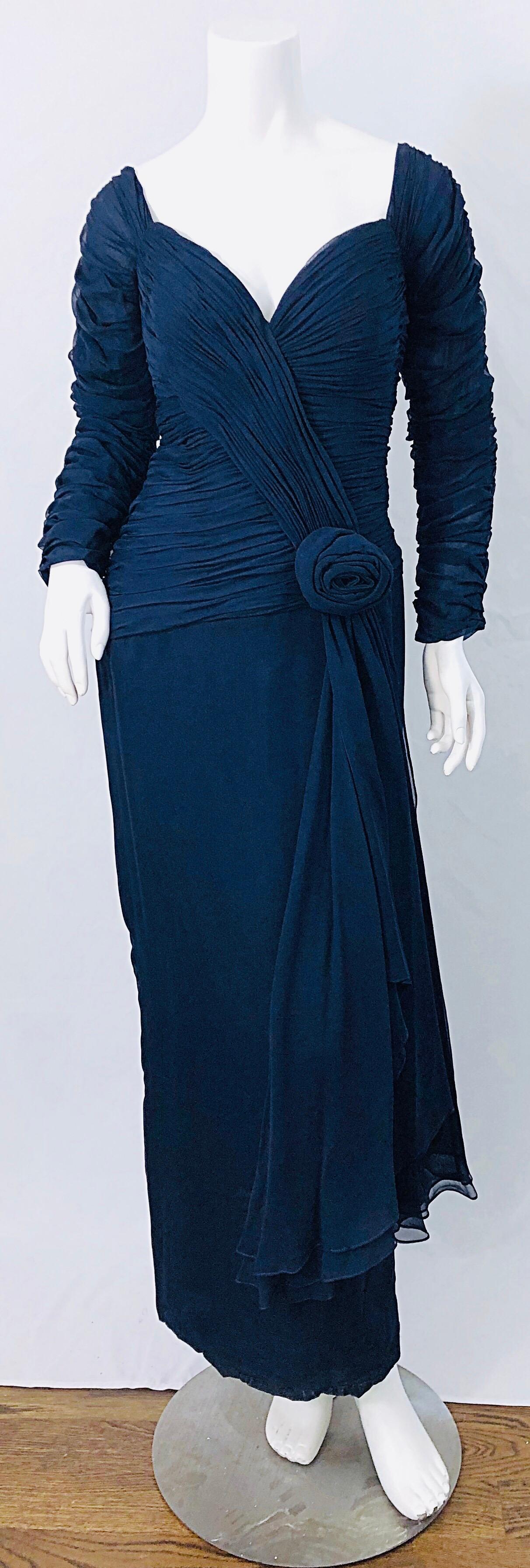 Incredible late 11980s navy blue silk chiffon couture quality long sleeve evening gown ! The perfect alternative to black. Features a boned sweetheart bodice. Flower appliqué at left waist. Layers of chiffon on the skirt look fabulous with movement.
