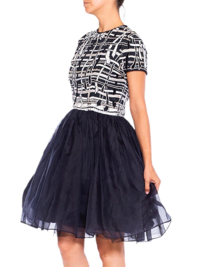 Navy Blue short cocktail dress with beaded sleeves main image 0