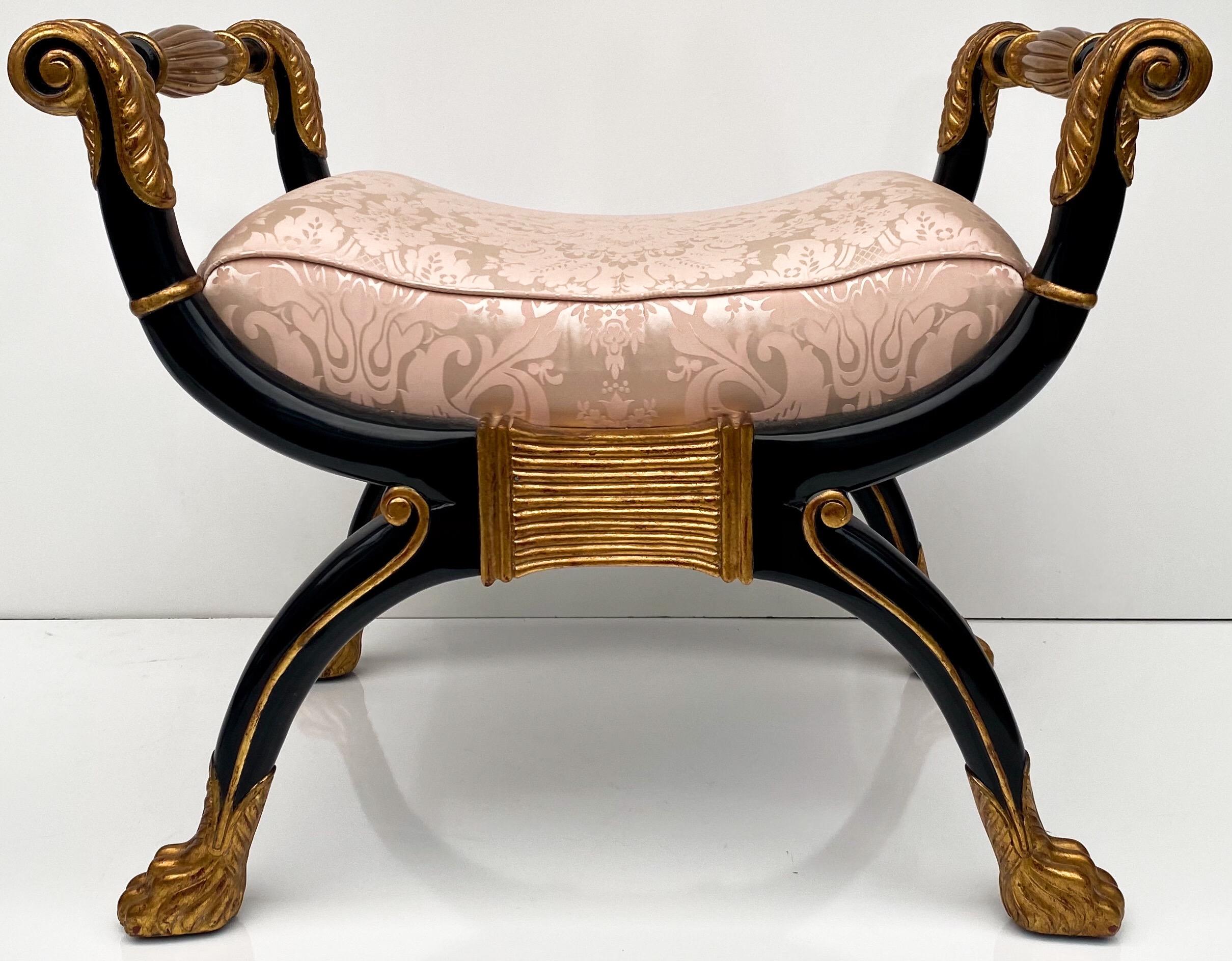 This is a pair of 1980s neoclassical style benches by Maitland-Smith. They are marked and in very good condition. The silk pink damask is vintage and only shows minor wear. The frames are ebonized with gilt accents.