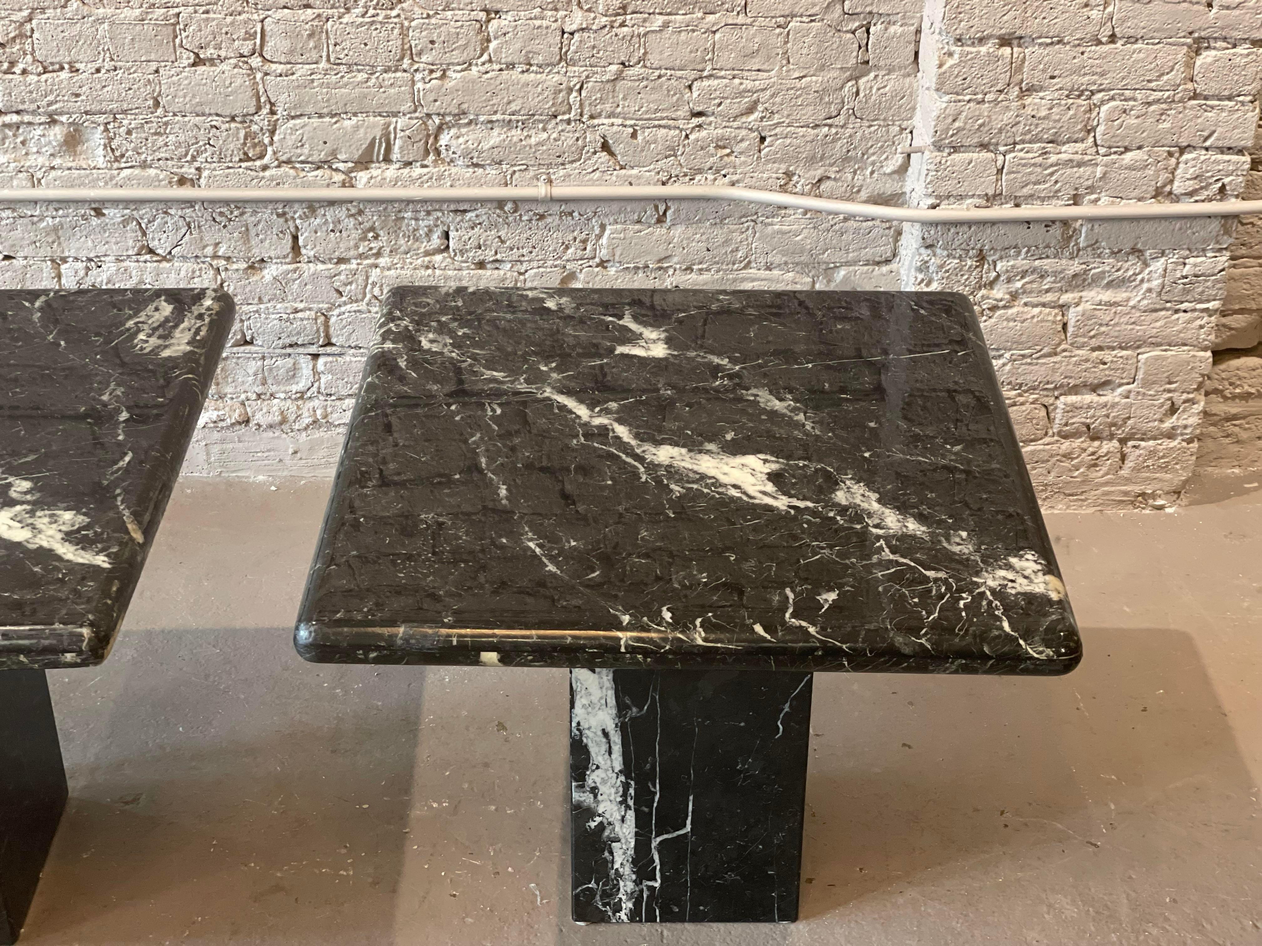 Beautiful pair of Nero Marquina tables. Absolutely love the veining. The original lacquer is in excellent condition.