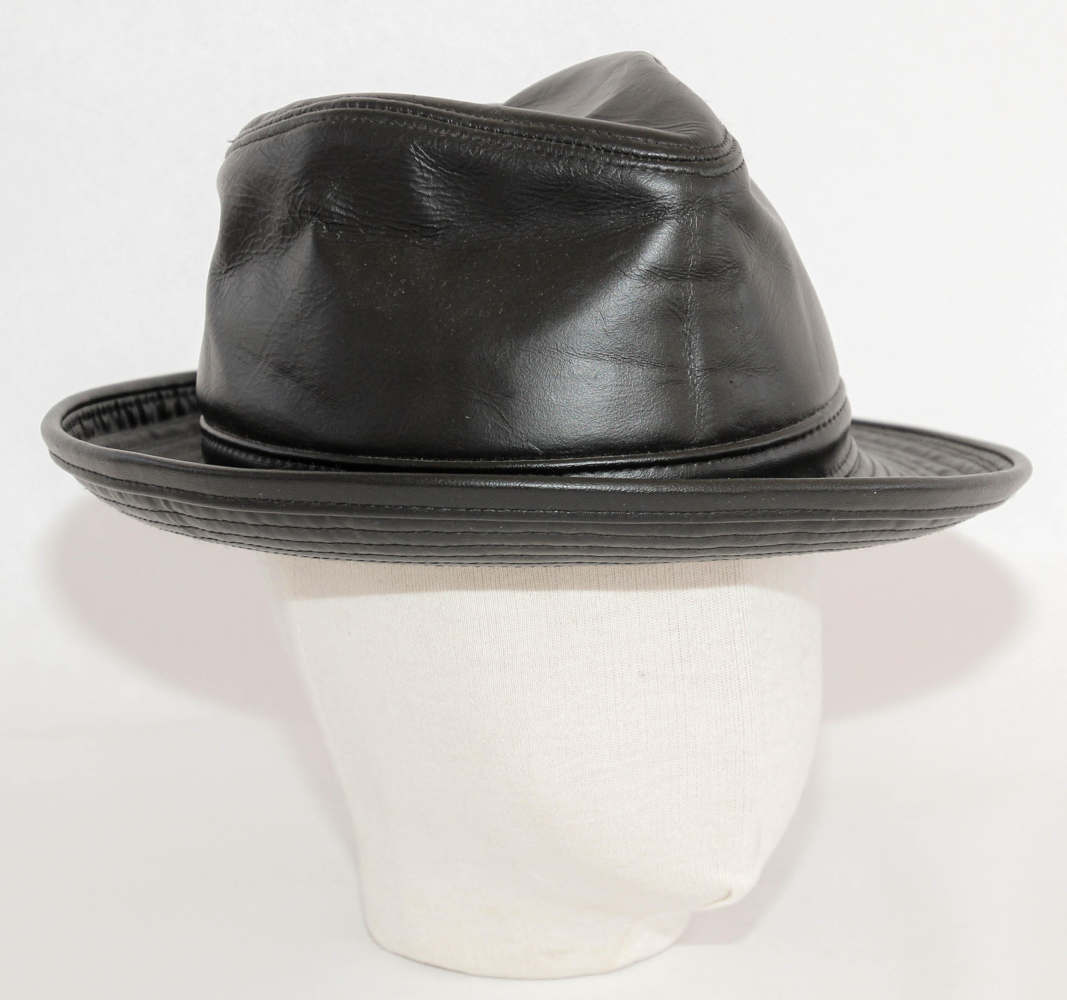 1980's New York Winner Lambskin Leather Fedora Hat.
Made in the USA.
The New York Winner Hat Company's Lambskin Leather Fedora Hat is a sleek and stylish trilby sending us back to the days of Frank Sinatra and 1940s' private eye films. The 100%