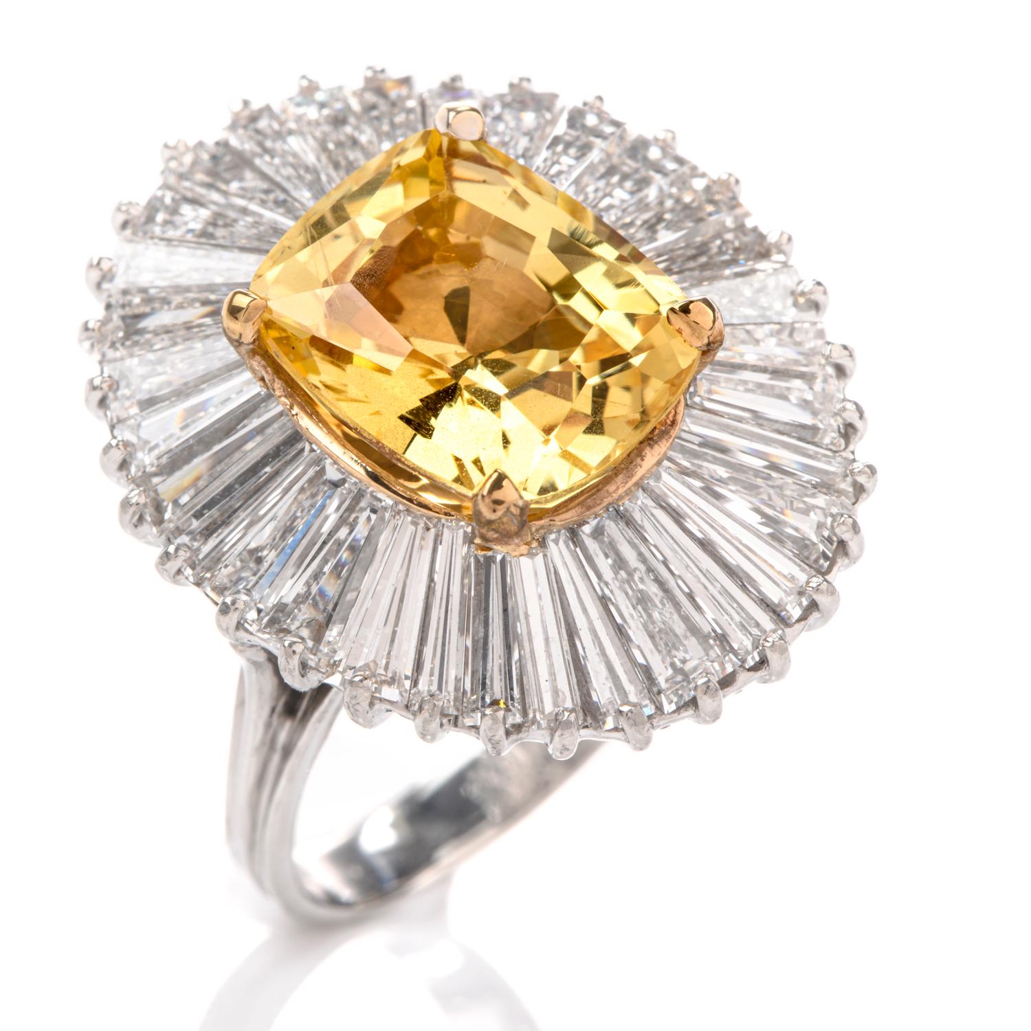 This Vibrant and Stately Diamond and GIA Certified Natural Yellow Sapphire

ring was inspired in a Ballerina design and crafted in 10.0 grams of luxurious Platinum.  Centered is a  6.46 carats non treated Natural Yellow Sapphire measuring 11.62 x