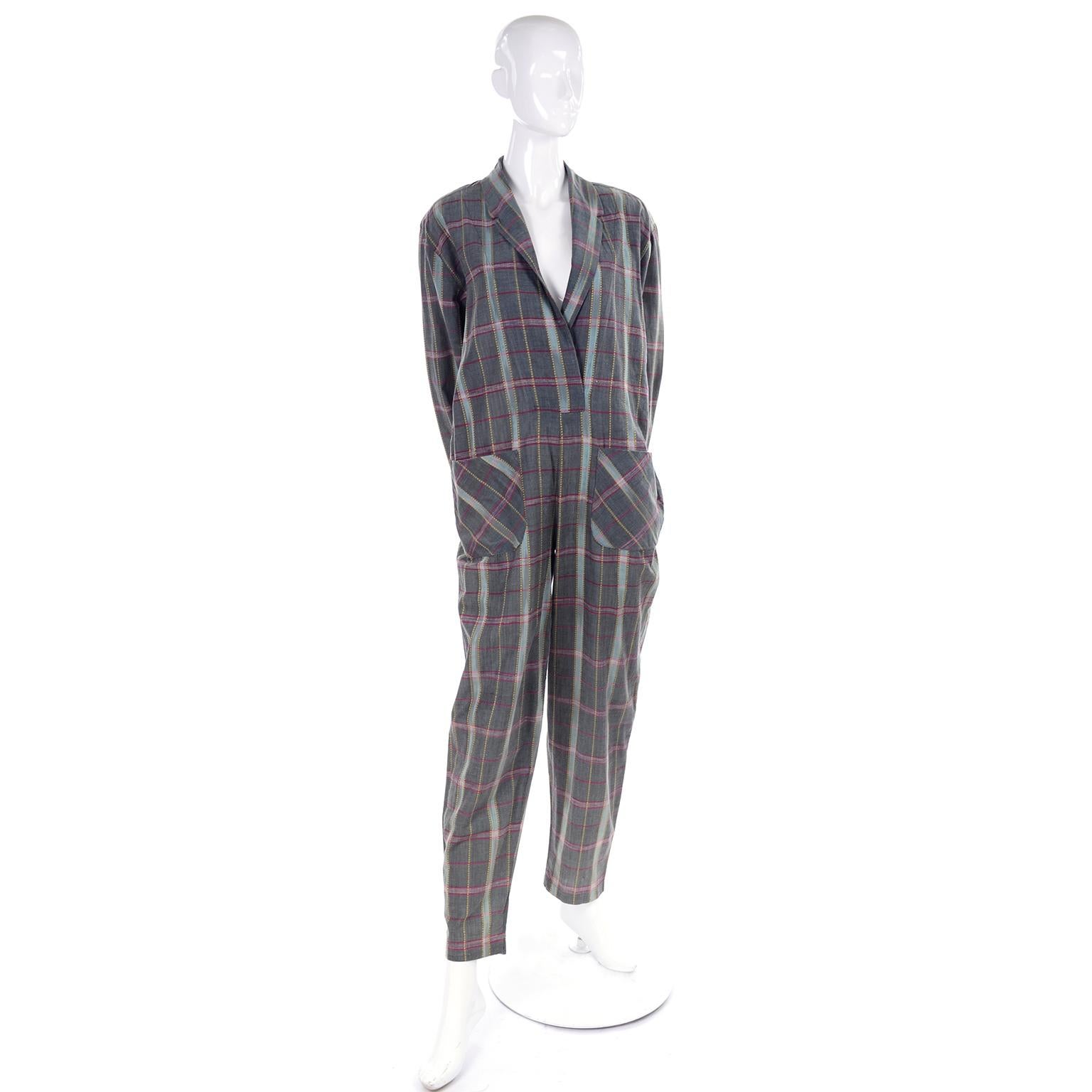 This is a perfect, loose fitting vintage jumpsuit to wear this Spring and Summer and into the Fall! The gray, yellow and burgundy plaid jumpsuit has an open front with lapels and no closures. This is such a versatile piece and it is so easy to wear!