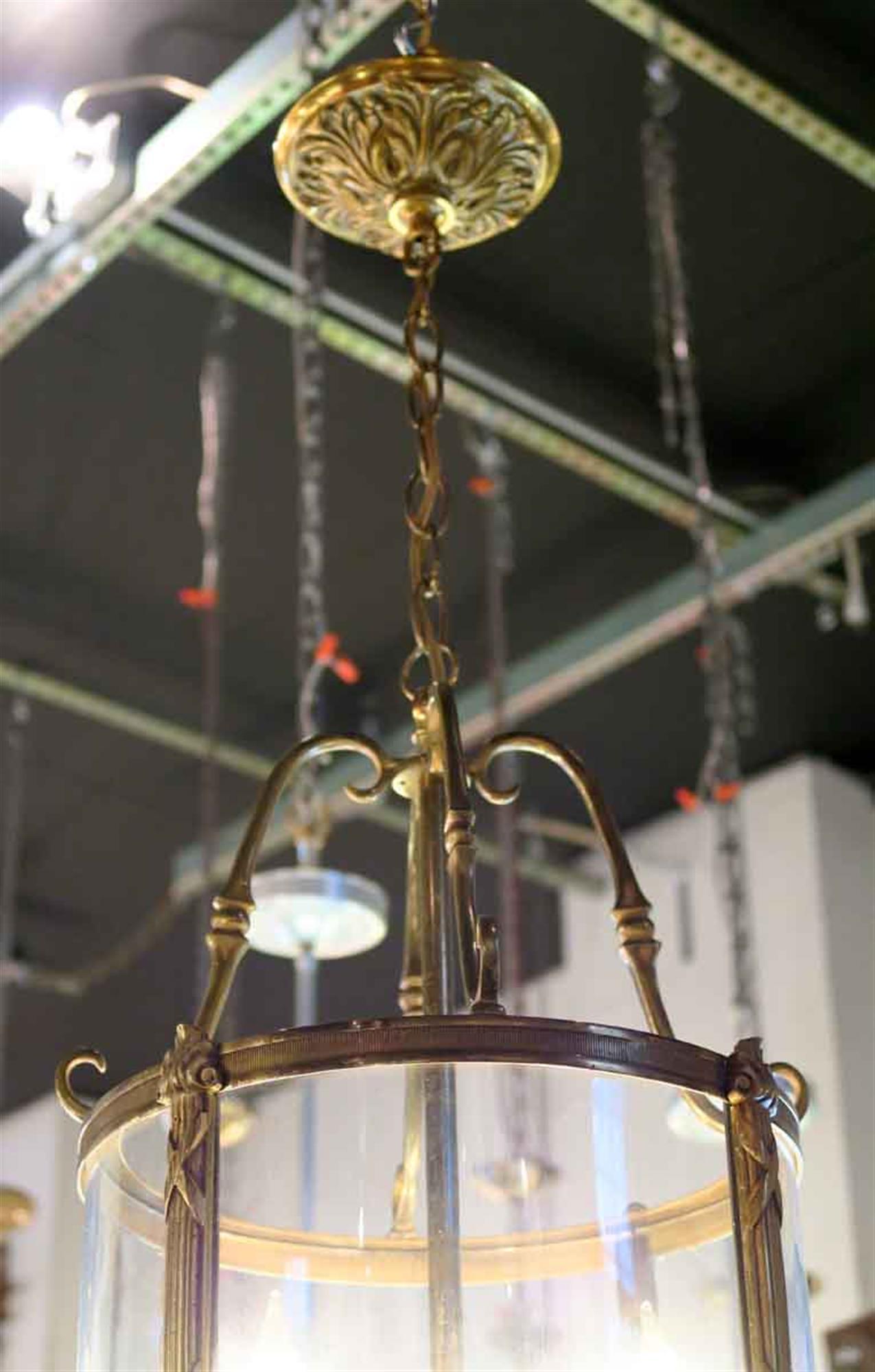 1980s NYC Waldorf Astoria Hotel four light bronze vestibule lantern with curved glass. This light is from the 40th floor of the Waldorf Astoria Towers. A Waldorf Astoria authenticity card included with your purchase. This can be seen at our 2420