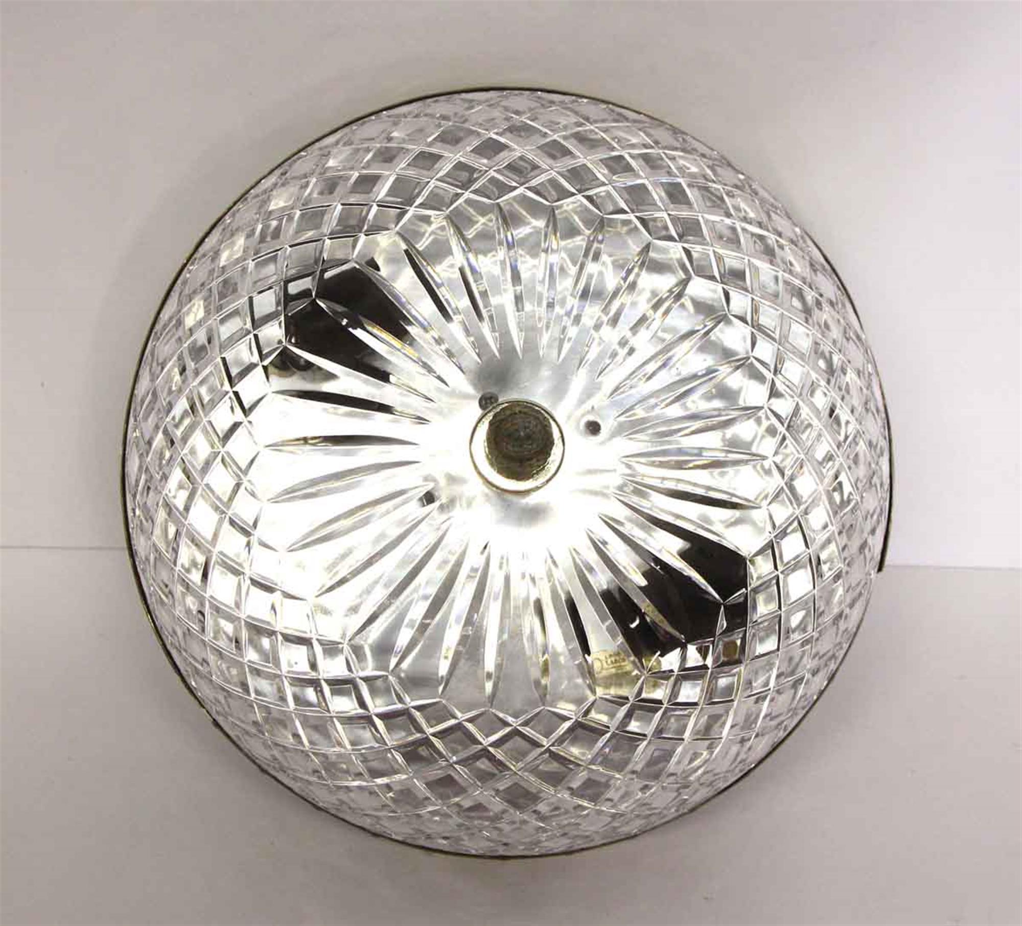 This large crystal flush mount light once adorned one of the main corridors of the first 17 floors of the Waldorf Astoria Hotel. Has two E26 light sockets. A Waldorf Astoria authenticity card included with your purchase. Small quantity available at