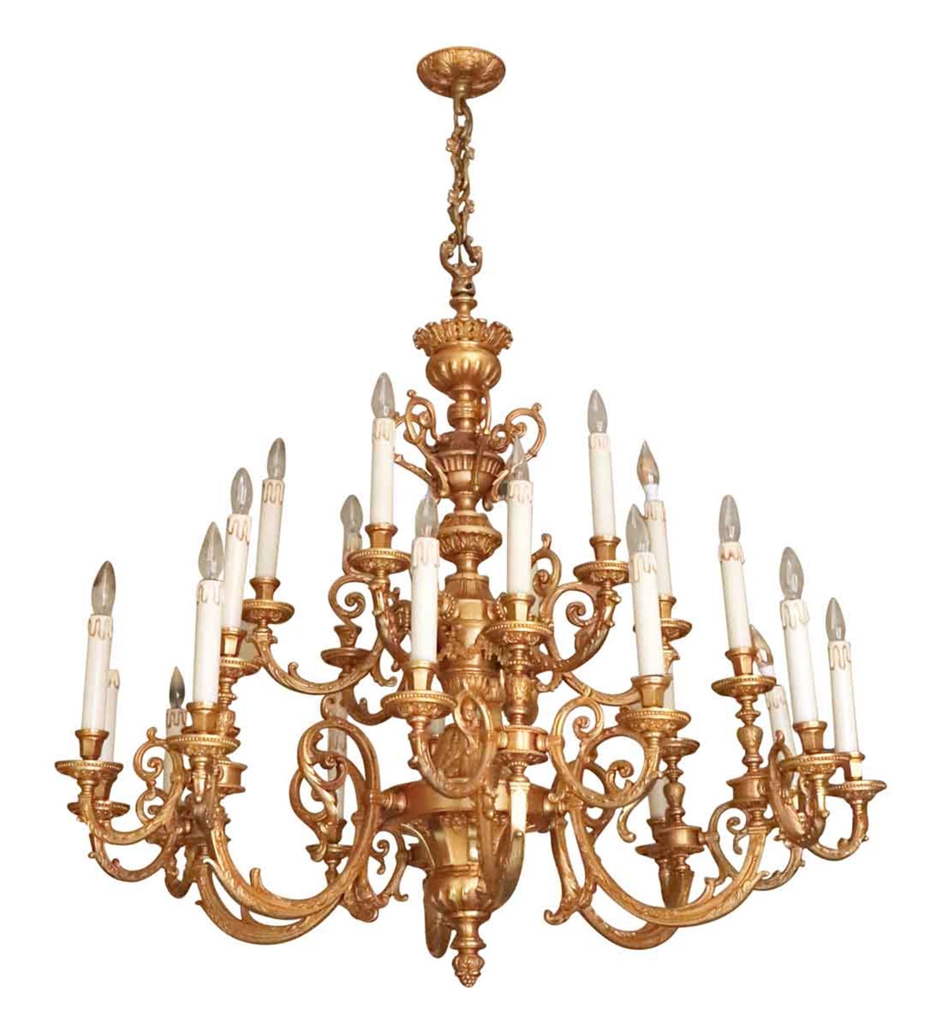 Large and elegant gold gilt over brass 24 arm chandelier. These are original to one of the 1980s NYC Waldorf Astoria Hotel banquet rooms on the 18th floor. A Waldorf Astoria authenticity card included with your purchase. This can be seen at our 2420