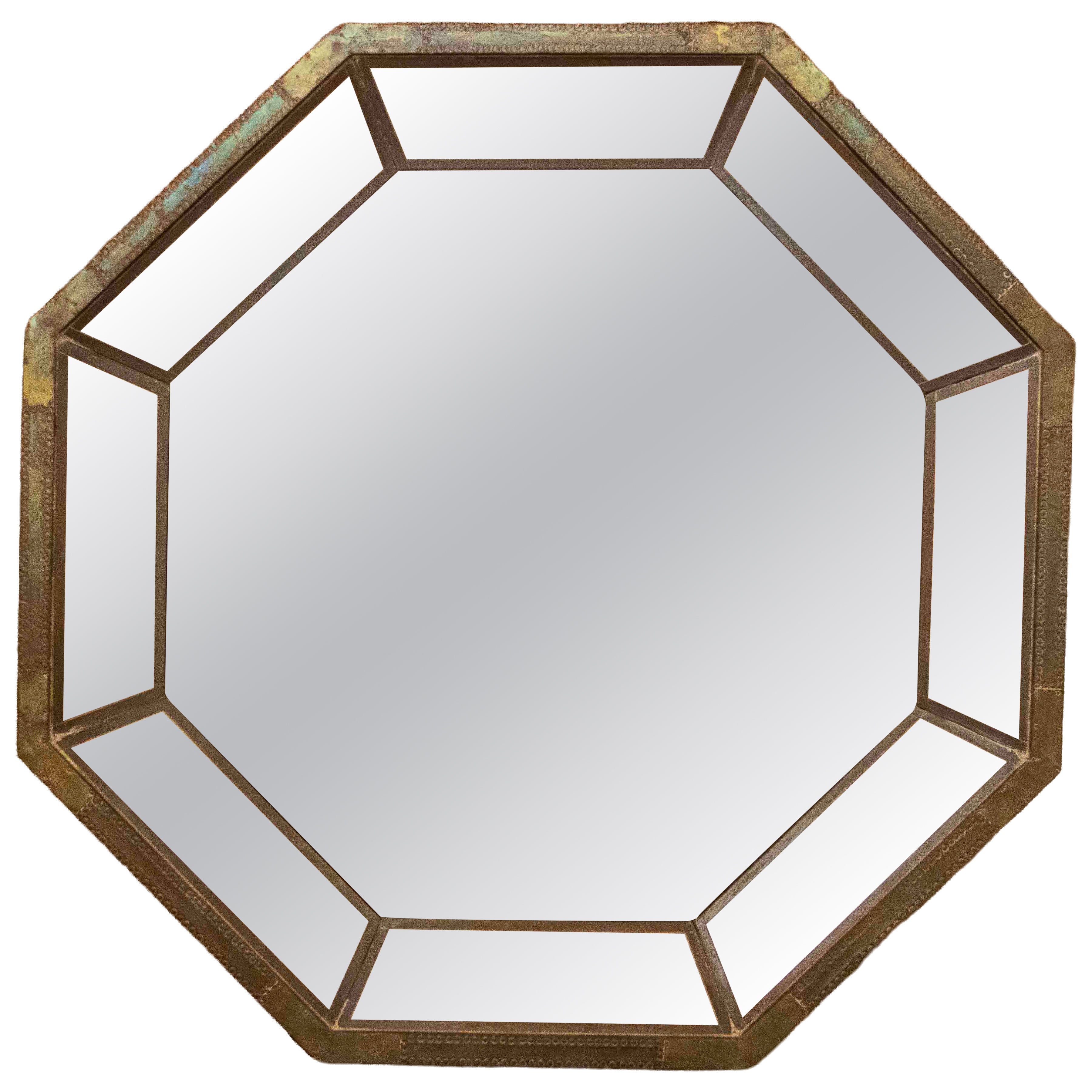 Miroir octogonal des années 1980 avec cadre en métal AGE, signé Rodolfo Dubarry. en vente