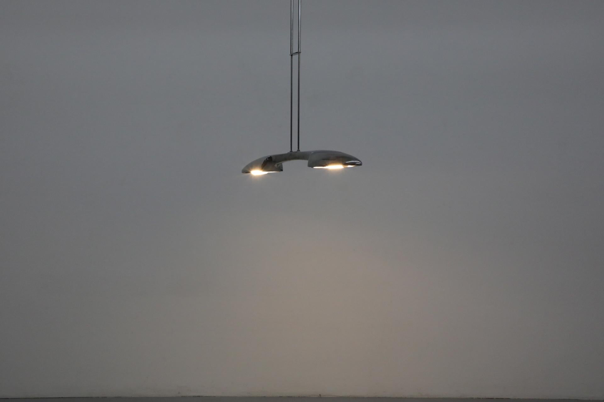 Incredibly designed, 1980's, Post-Modern pendant lamp by Jorge Pensi for B.Lux. An eye catching aluminum framed ceiling light with tons of style. Jorge Pensi created the Olympia Billar pendant from cast aluminum in 1988 for Spain's B-lux (Belux)