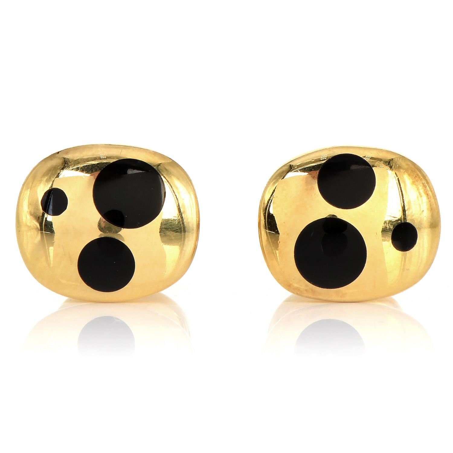 Bright and dazzling highly polished men's cufflinks, with a modern three-black dotted style. 

Crafted in solid 18K Yellow Gold,  composed of 6 round-cut, flush set, Black Onyx stones.

The complete piece measures approximately 15 mm x 12 mm, with a