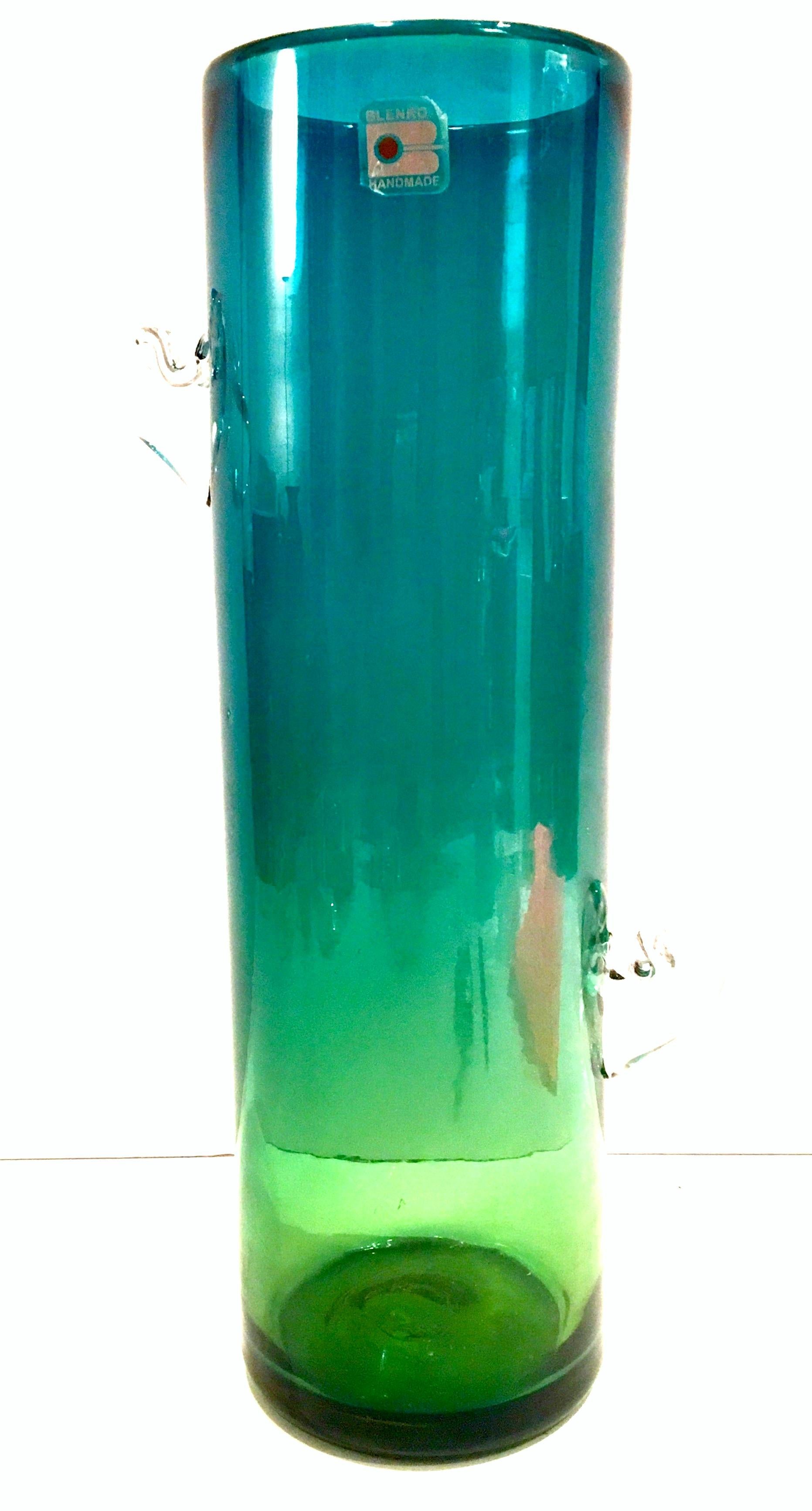 1980'S Organic modern Blenko blow glass blue and green ombre tall cylinder vase with clear applied abstract handles. Signed-original Blenko glass 