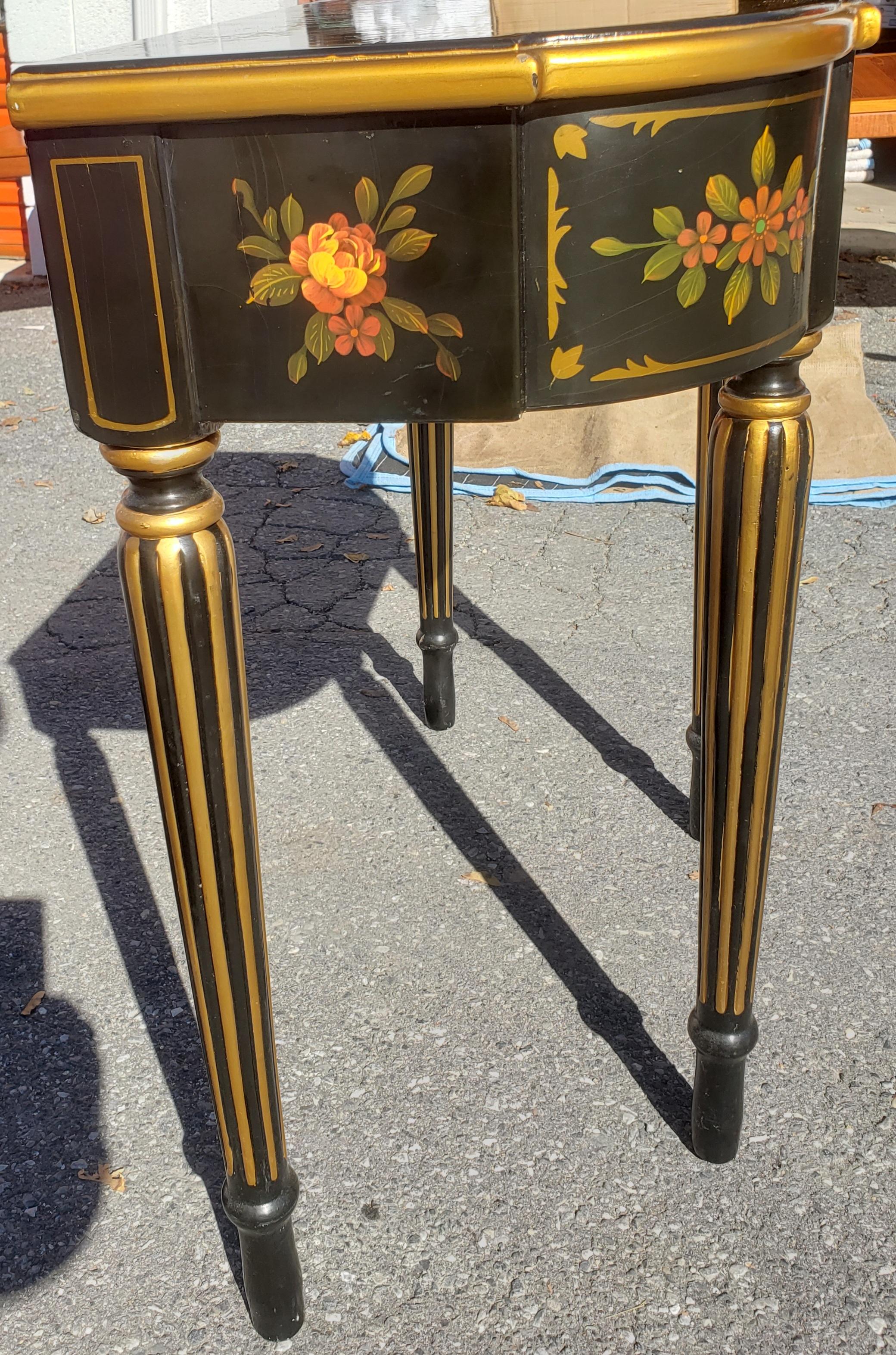 1980s Oriental Accent Hitchcock Style console table and mirror. Crackle lacquer Paint on console top. Hand painted flowers on top and sides. Banded golden paint and column legs.
Very beautiful. We have a matching authentic Lambert Hitchcock Chair