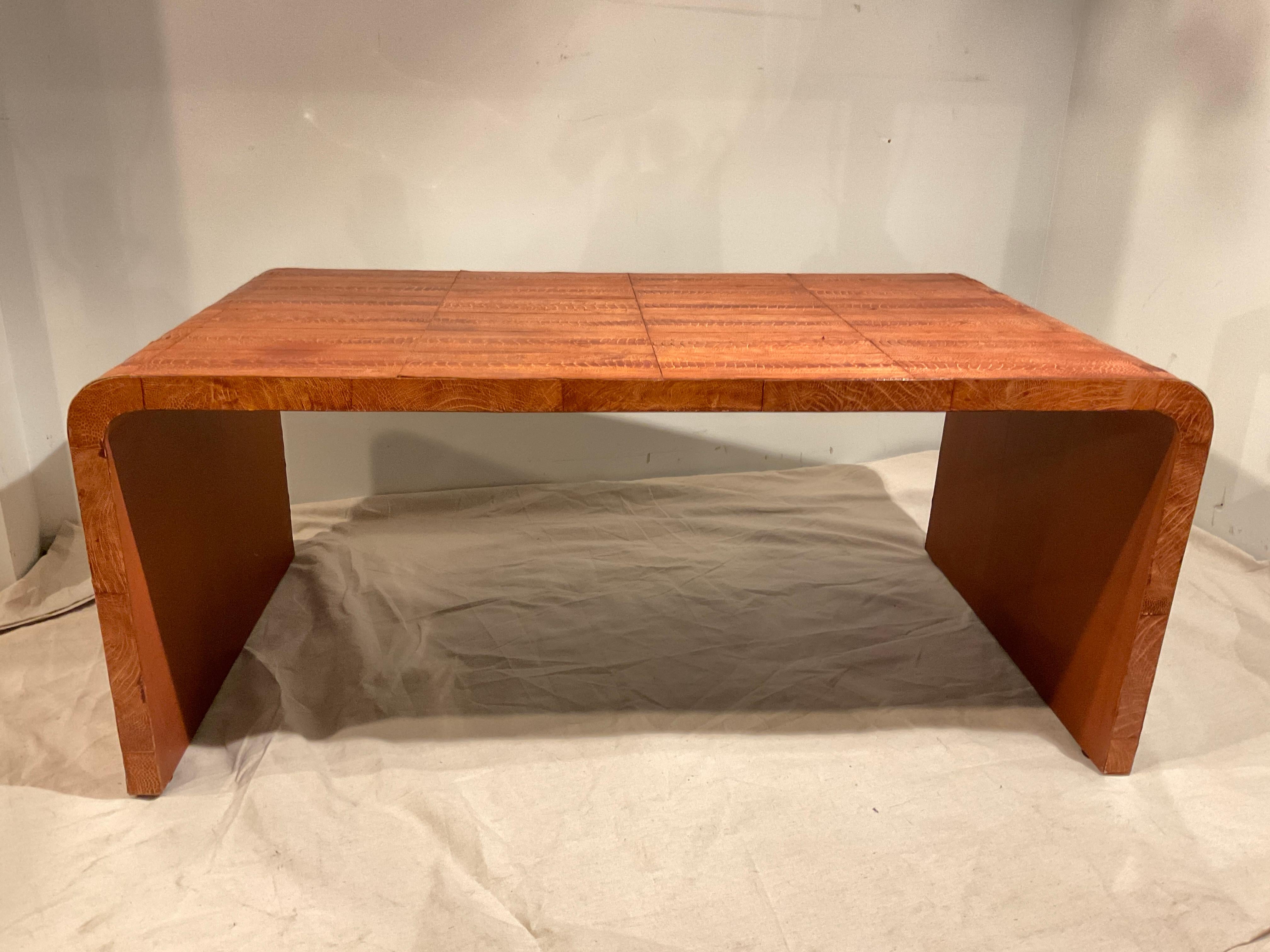 1980s Ostrich skin ( from the leg ) coffee table. A few  nicks  in skin as shown in pictures.