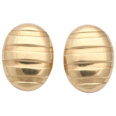1980s Oval Shaped High Polish Ridged Gold Textured Earclips with Posts