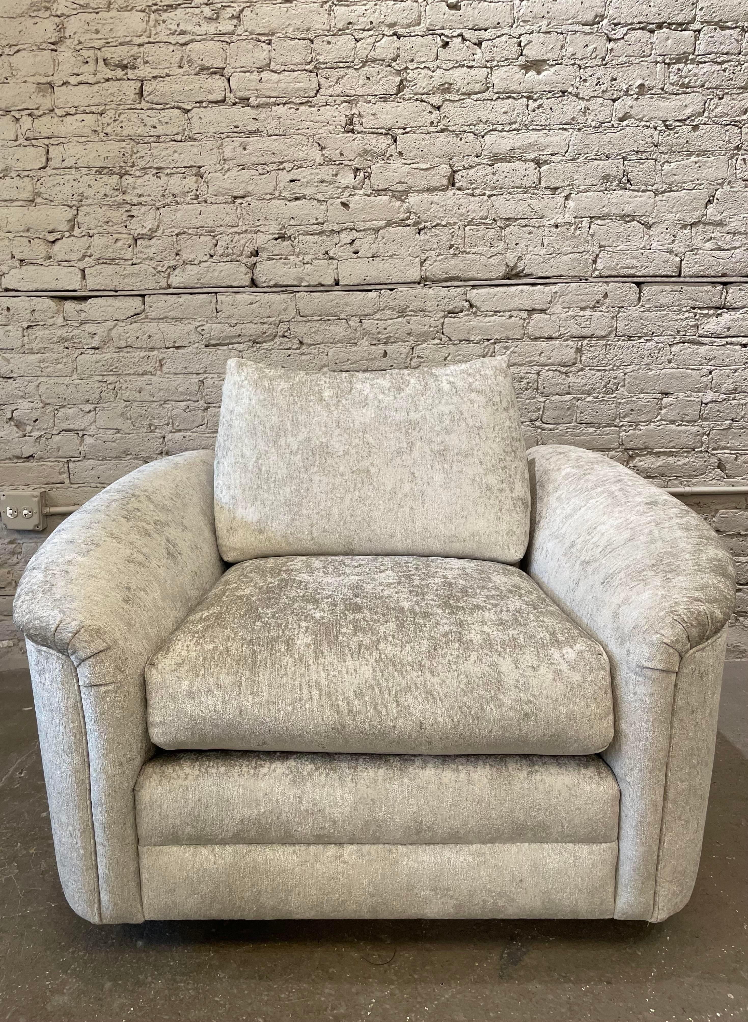 Oooh super comfy swivel chair. Oversized. Perfect for snuggling with a great book. Reupholstered in an oyster two tone velvet (I love this fabric and have used it a lot in my own home).

Matching ottoman is 24”W 20”D 17”H